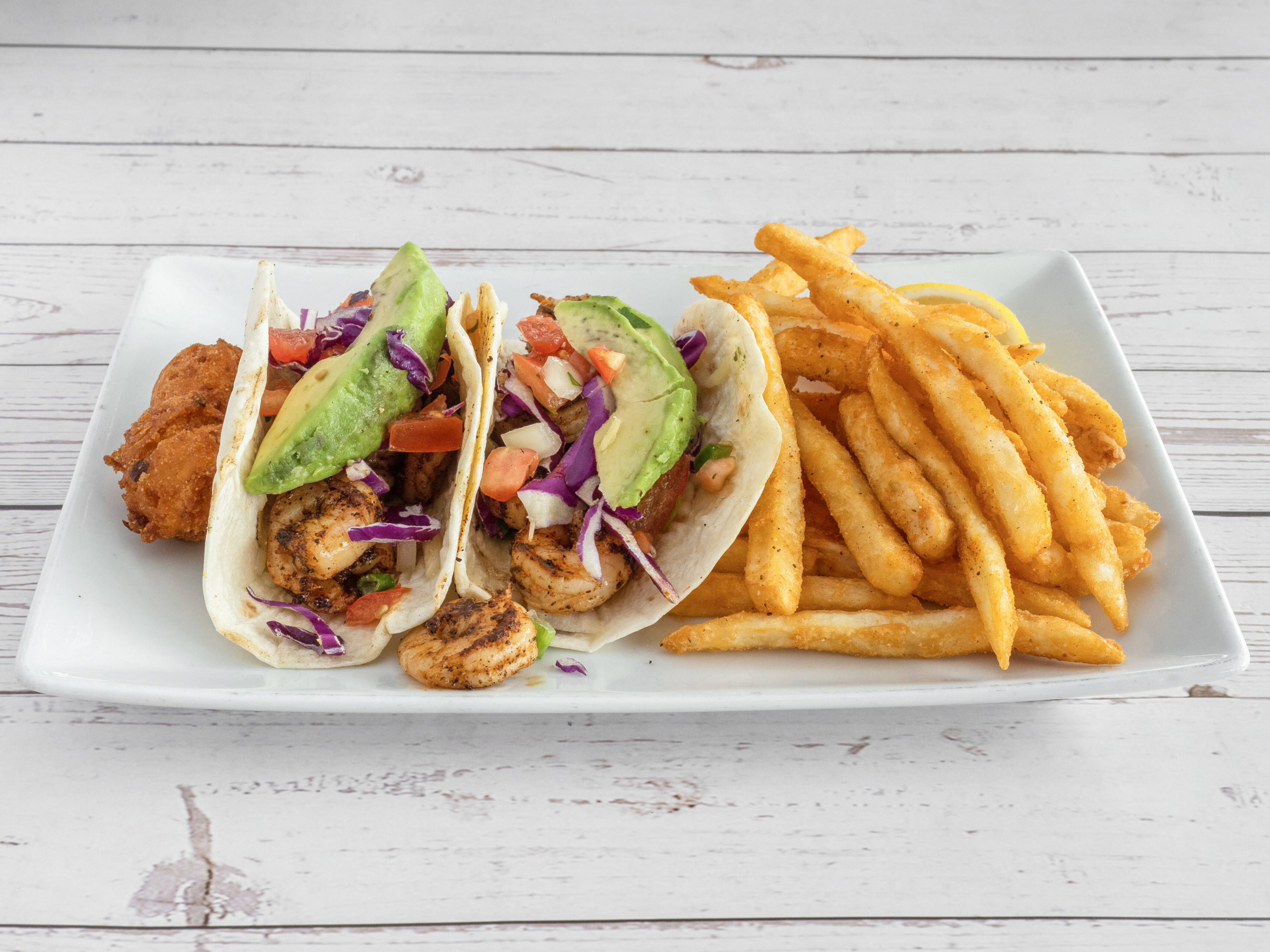 Order Popcorn Shrimp Tacos food online from The Catch store, Oklahoma City on bringmethat.com