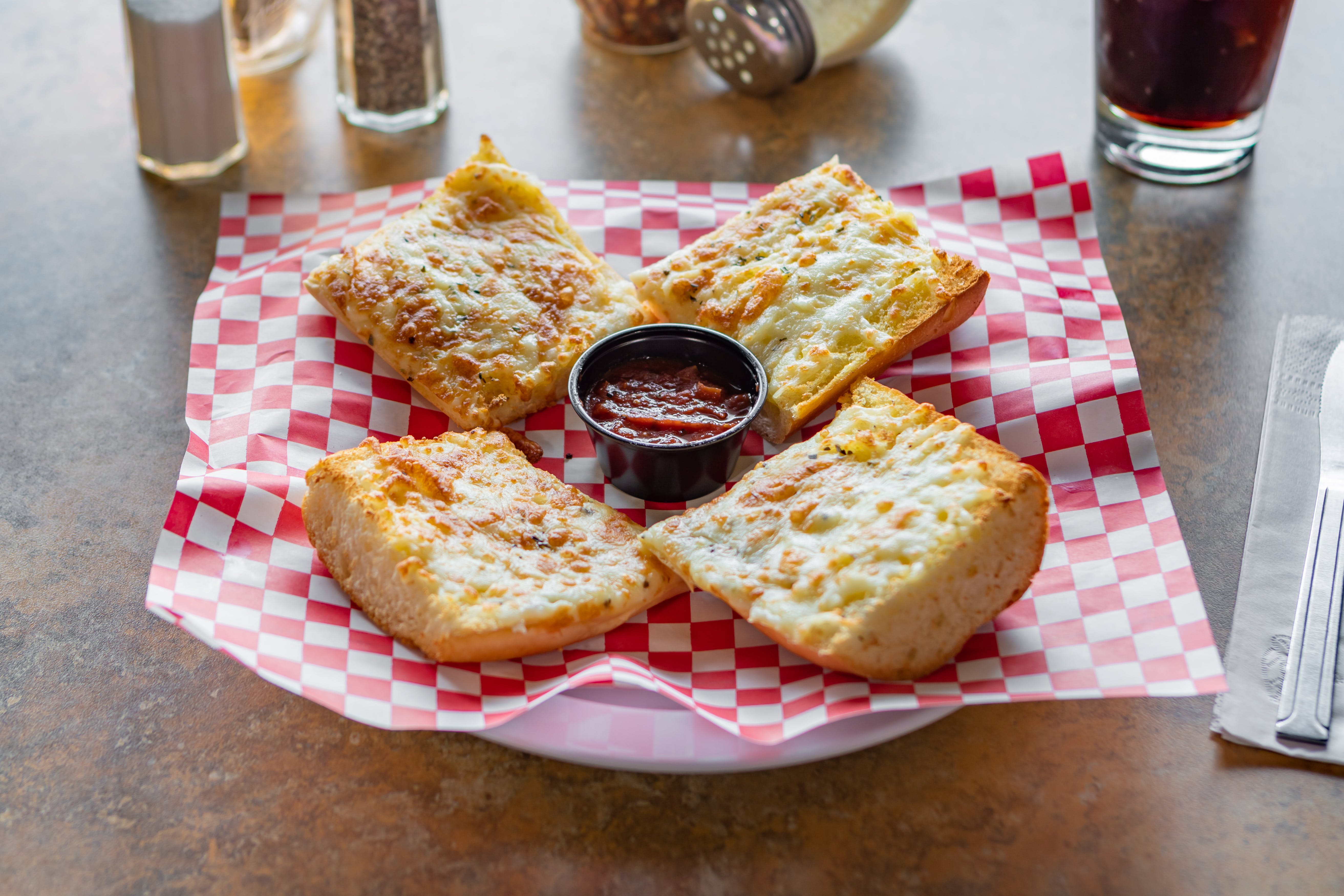 Order Cheese Garlic Bread - Appetizer food online from Saucy's Pizzeria store, Hillsboro on bringmethat.com