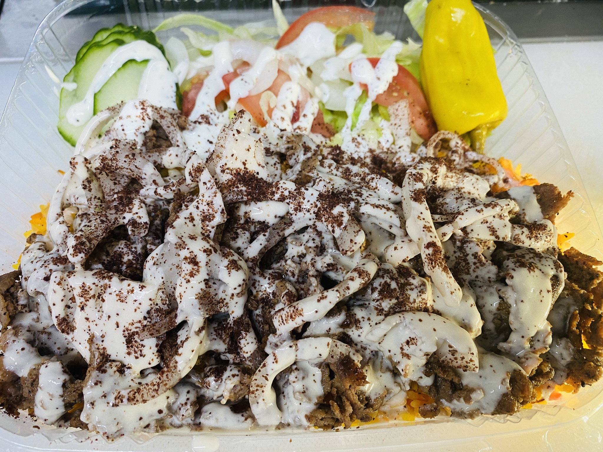 Order Beef Shawarma Over Rice Plate food online from Mr. Falafel inc store, Sterling on bringmethat.com