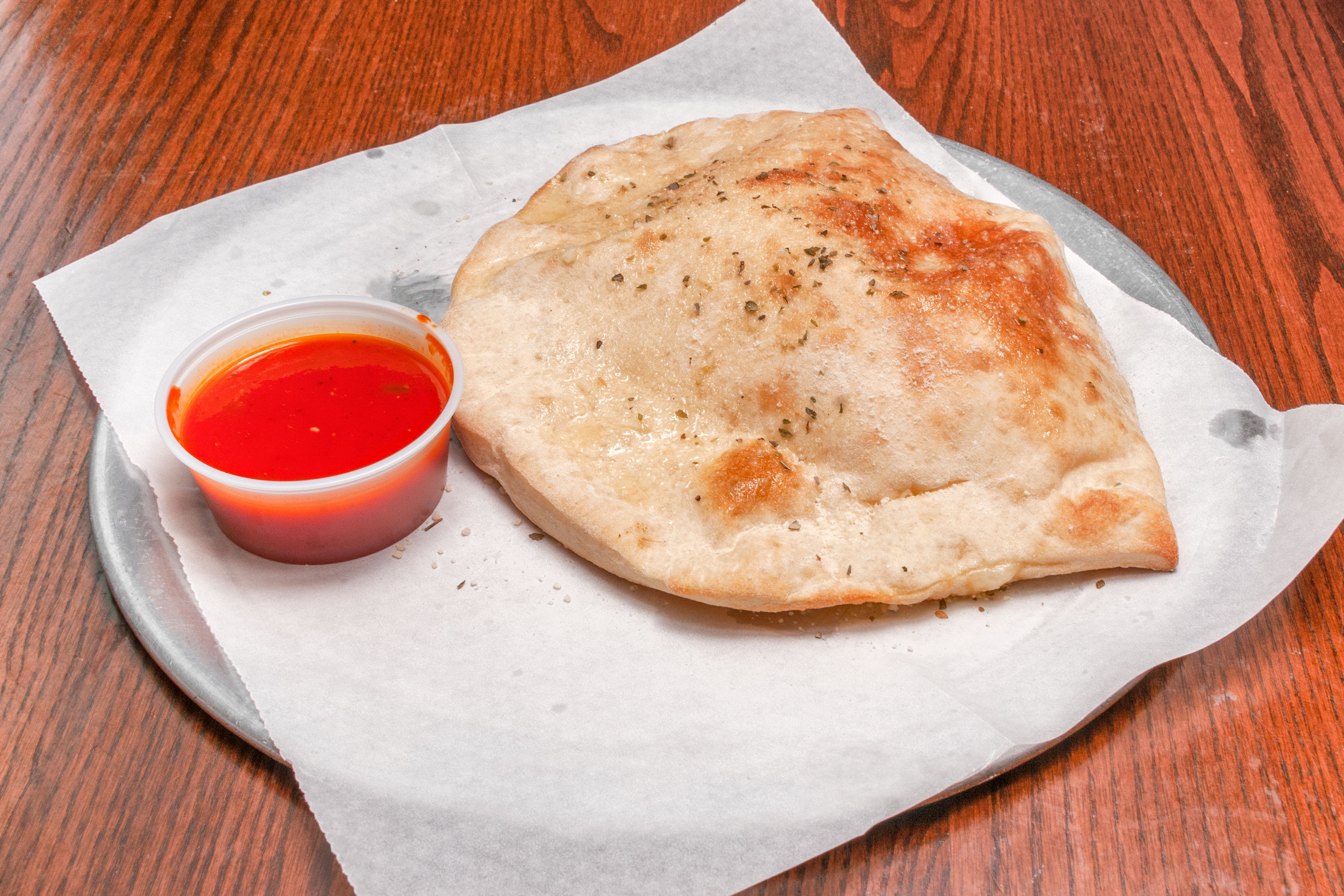 Order Build Your Own Calzone - Calzone food online from Primo Pizza Ny Style store, Cary on bringmethat.com