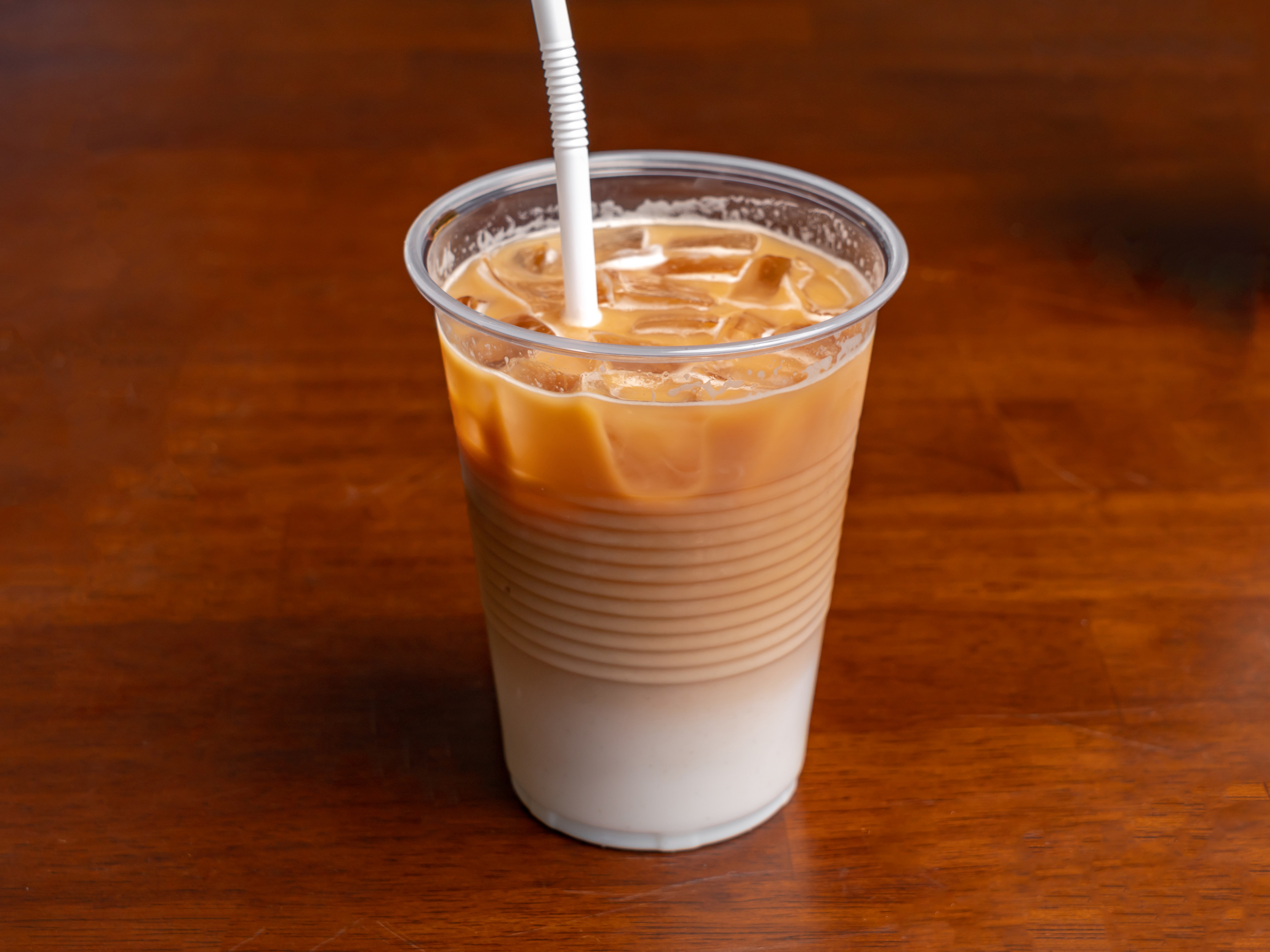 Order Small Iced Latte  (16 Oz) food online from Ooh La La Bakery Llc store, Silver Spring on bringmethat.com