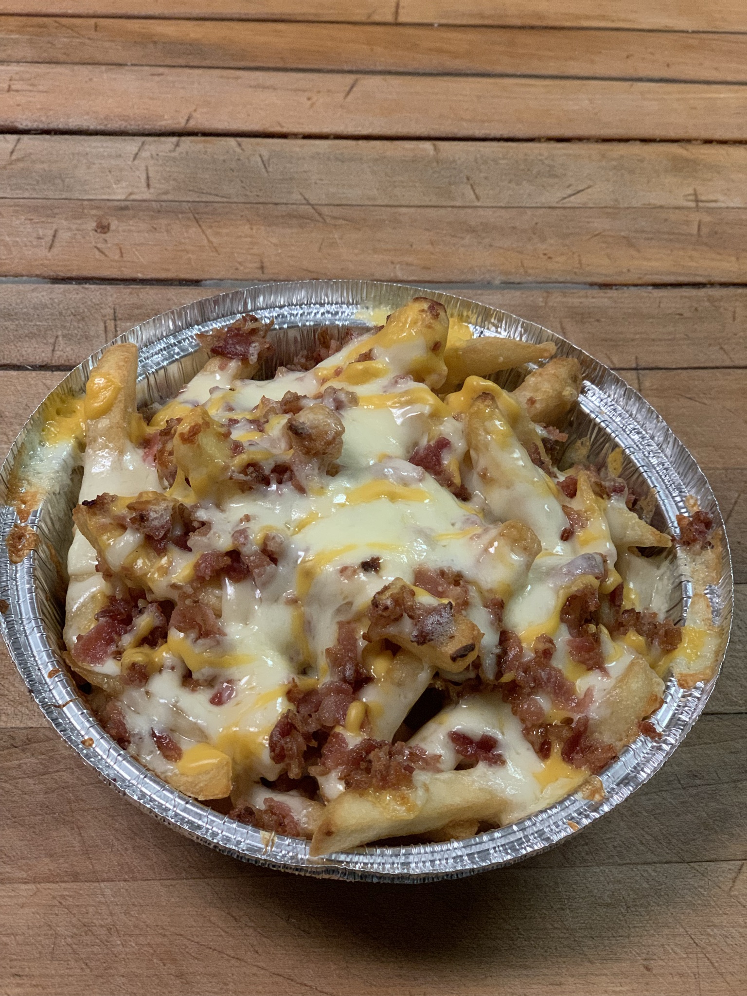 Order "Killer" French Fries food online from New Station Pizza store, Souderton on bringmethat.com