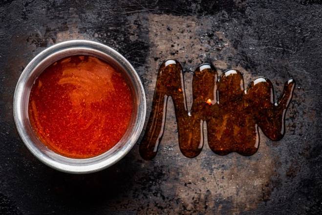Order Honey Sriracha Sauce (medium) food online from Chili'S Grill &Amp; Bar store, Dayton on bringmethat.com