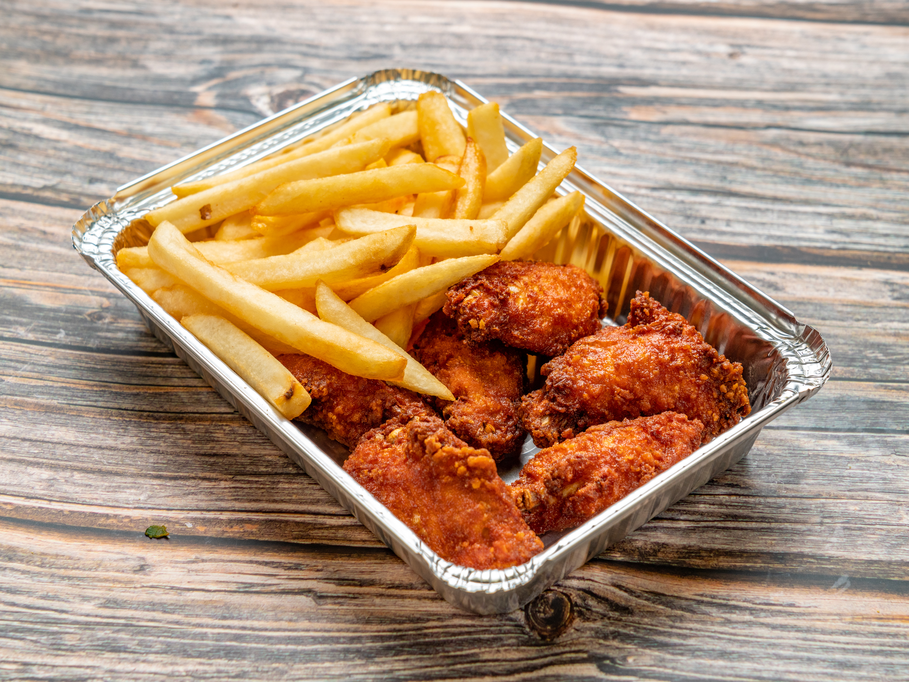 Order 6 Piece Hot Wings with Fries food online from The Sandwich Spot store, Rockaway Beach on bringmethat.com