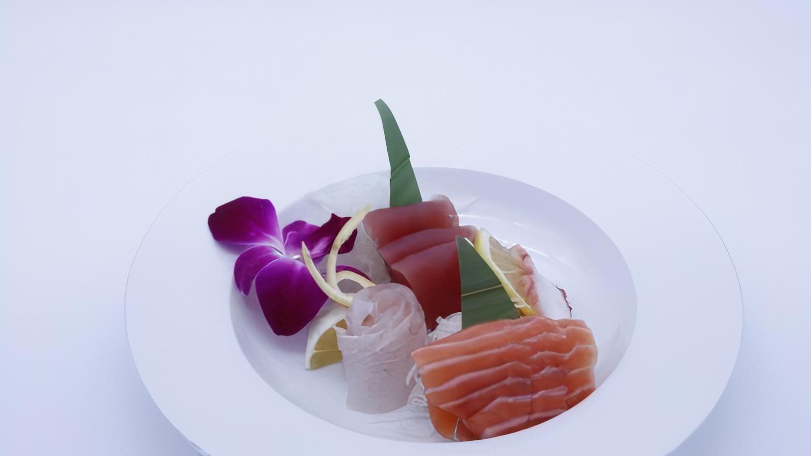 Order Deluxe Sashimi Plate food online from Sapporo Revolving Sushi store, Las Vegas on bringmethat.com