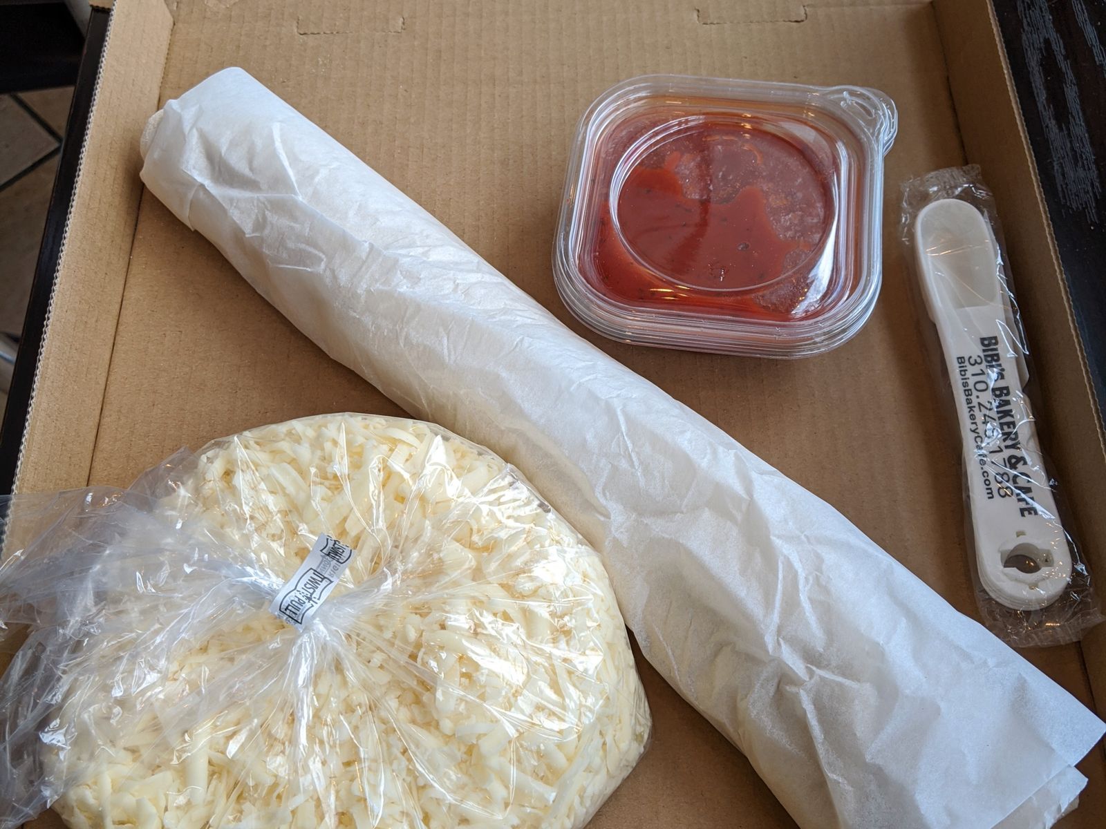 Order Pizza Kit 1 large dough (plus the sauce and cheese) food online from Bibi's Bakery Cafe store, Los Angeles on bringmethat.com