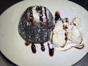Order Warm Chocolate Lava Cake with Ice Cream food online from Bistro 1051 store, Clark on bringmethat.com