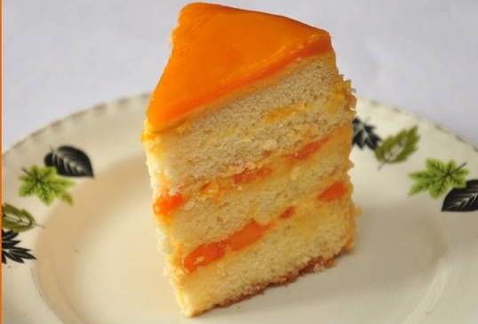 Order MANGO MOUSSE CAKE food online from Casa Di Pizza store, Columbus on bringmethat.com