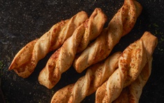 Order Garlic Parmesan 3 Twists food online from Round Table Pizza store, Laguna Niguel on bringmethat.com