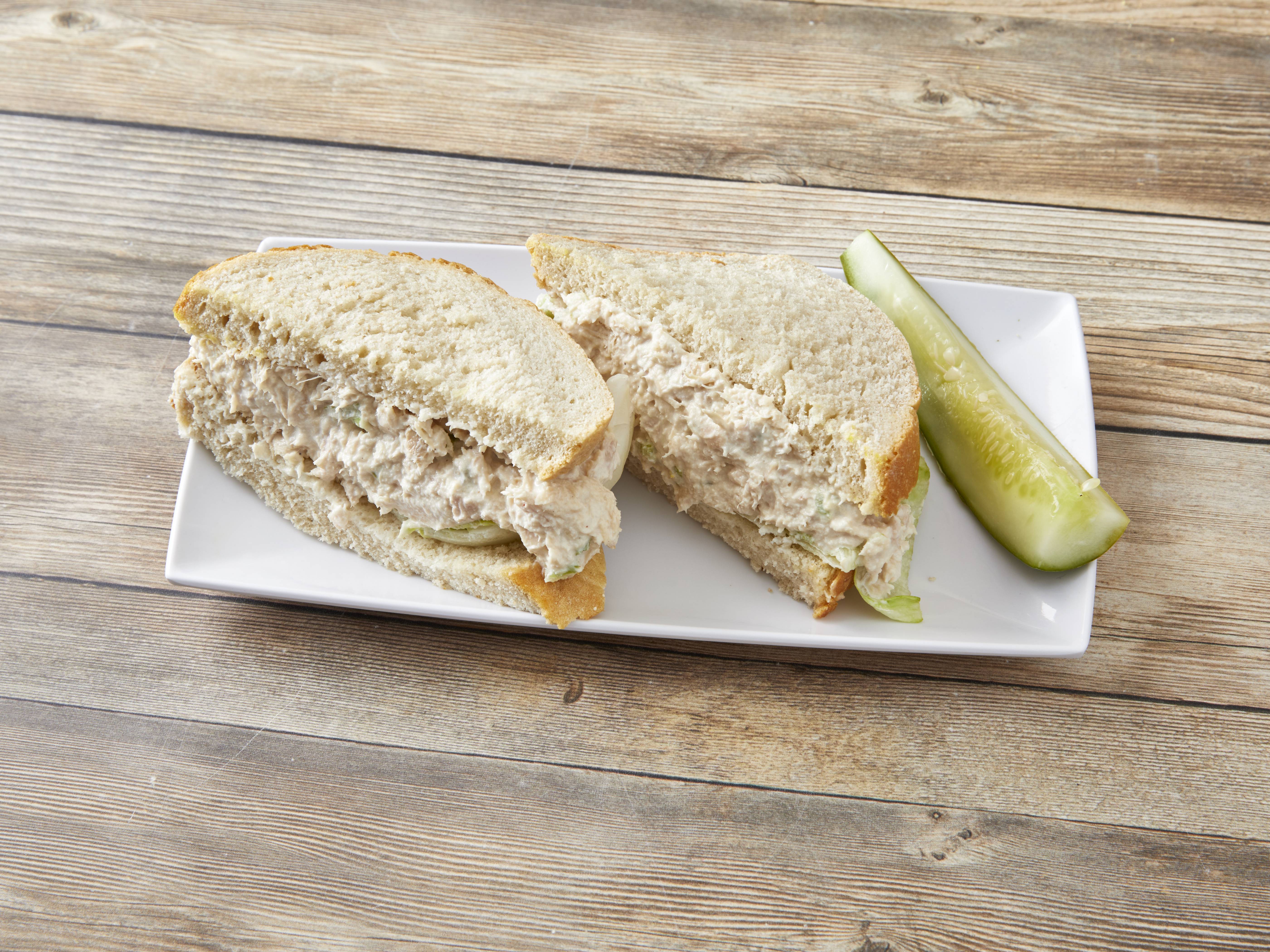 Order White Tuna Salad Sandwich food online from Bread Basket Deli store, Livonia on bringmethat.com