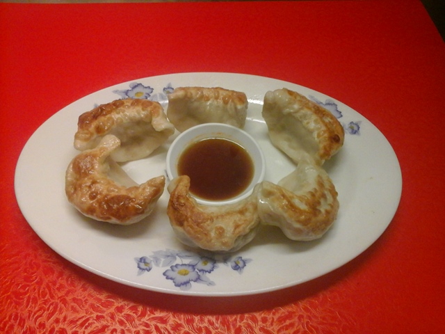 Order 10 Piece Pot Stickers food online from New Bamboo Kitchen store, Alameda on bringmethat.com