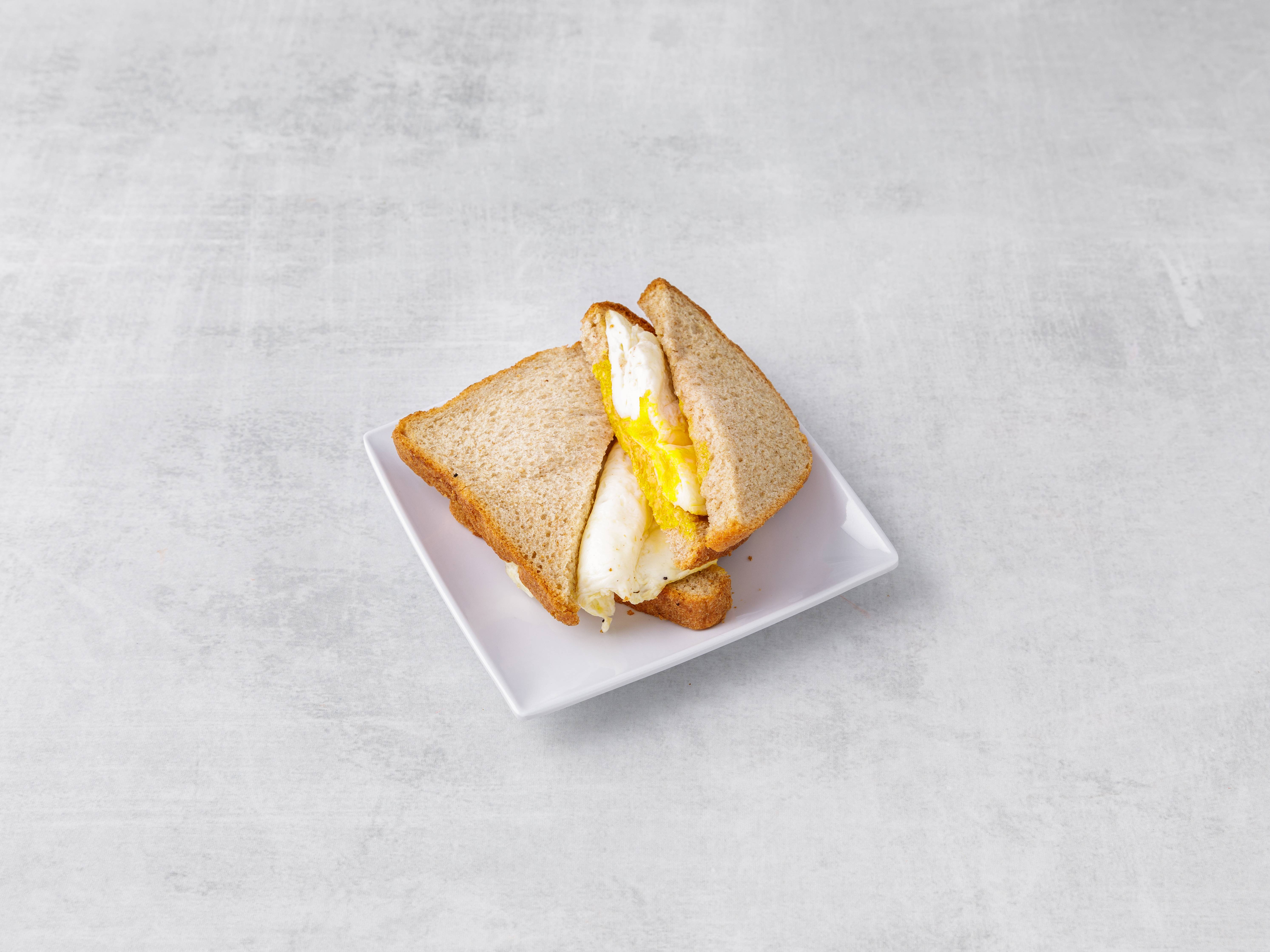Order 2 Egg Any Style Sandwich food online from Metropolitan Cafe store, Fairview on bringmethat.com