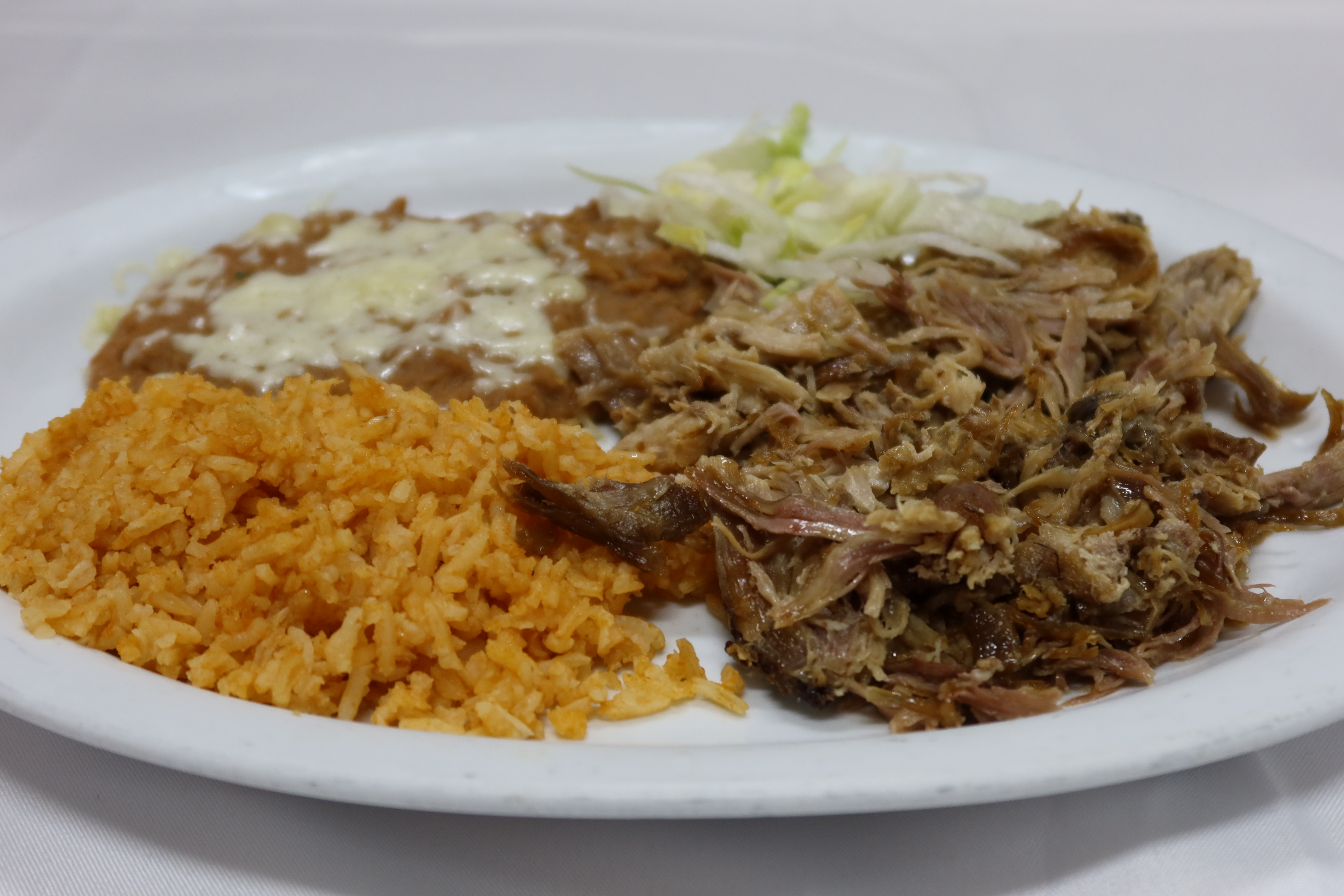 Order Carnitas Plate food online from Los Pinos Mexican Food store, Concord on bringmethat.com
