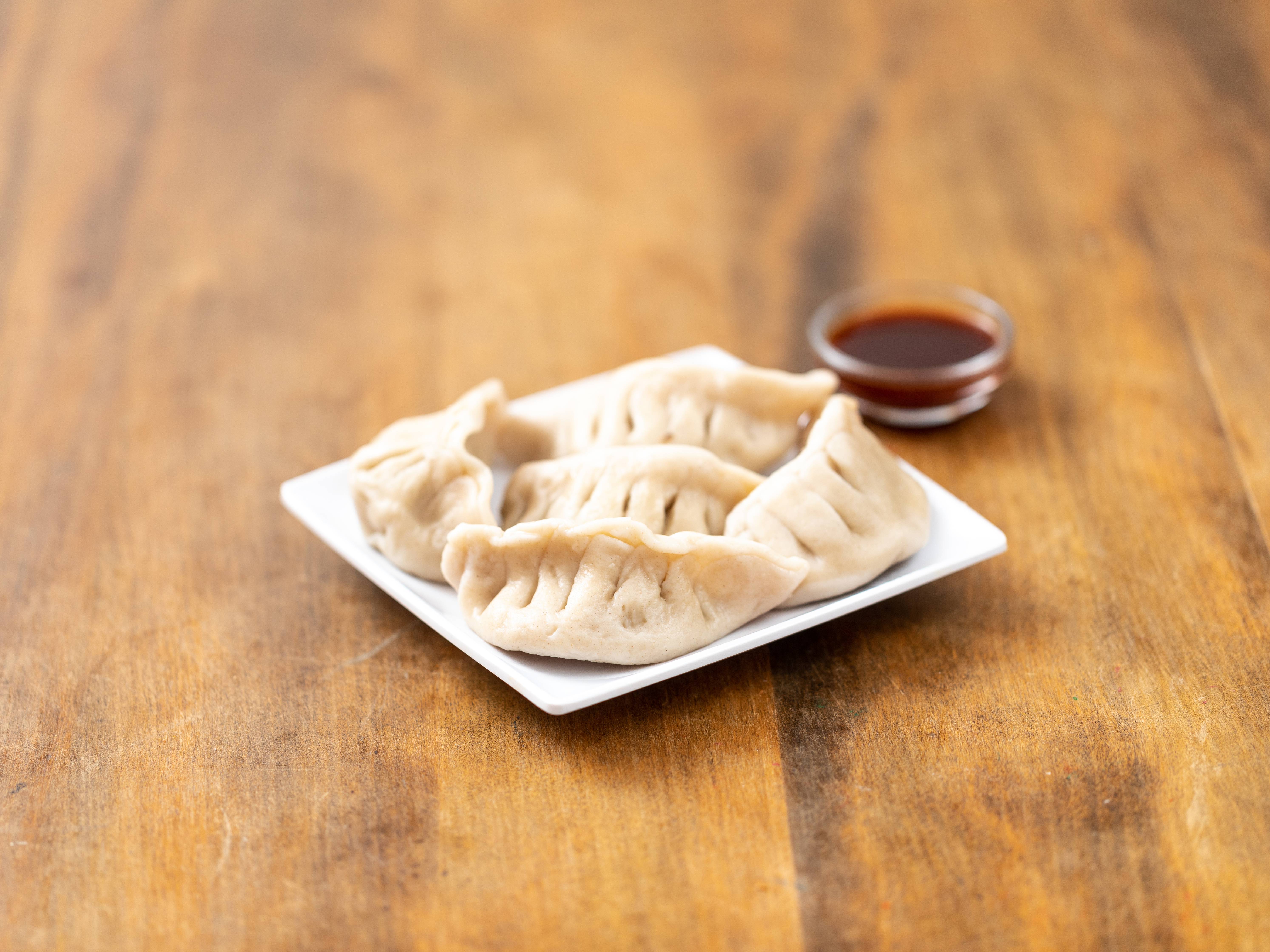 Order 4. Steamed Dumpling food online from Mandarin Carry-Out store, Washington on bringmethat.com