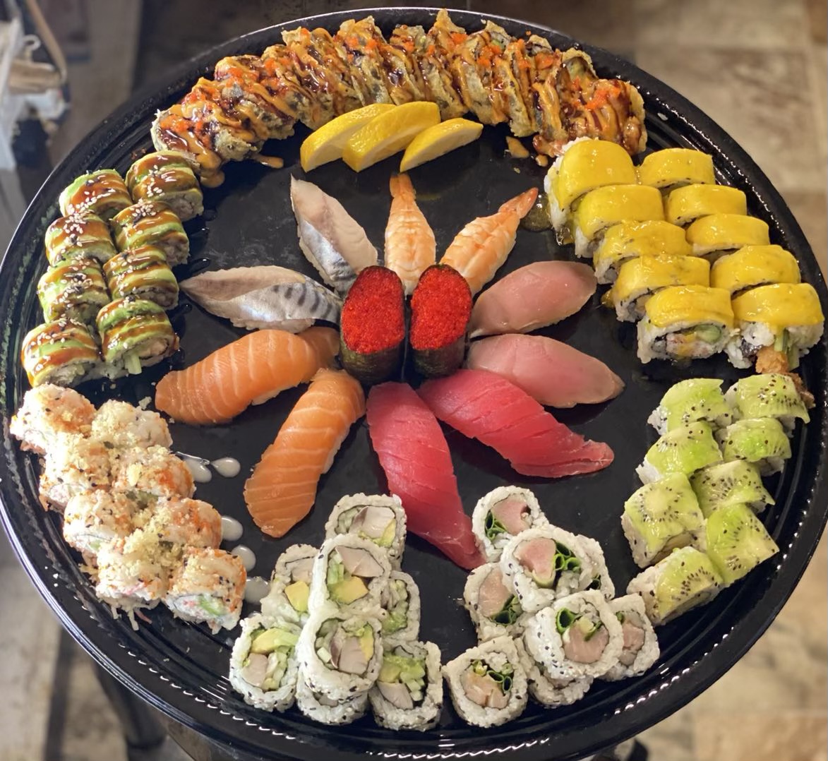 Order Sushi Rolls & Nigiris Combo寿司卷&贴面拼盘/Value $109.87 food online from Tengu Sushi store, Newport on bringmethat.com