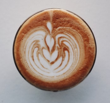 Order Caramel Latte food online from Holy Grounds At St. Paul Catholic Church store, Chicago on bringmethat.com