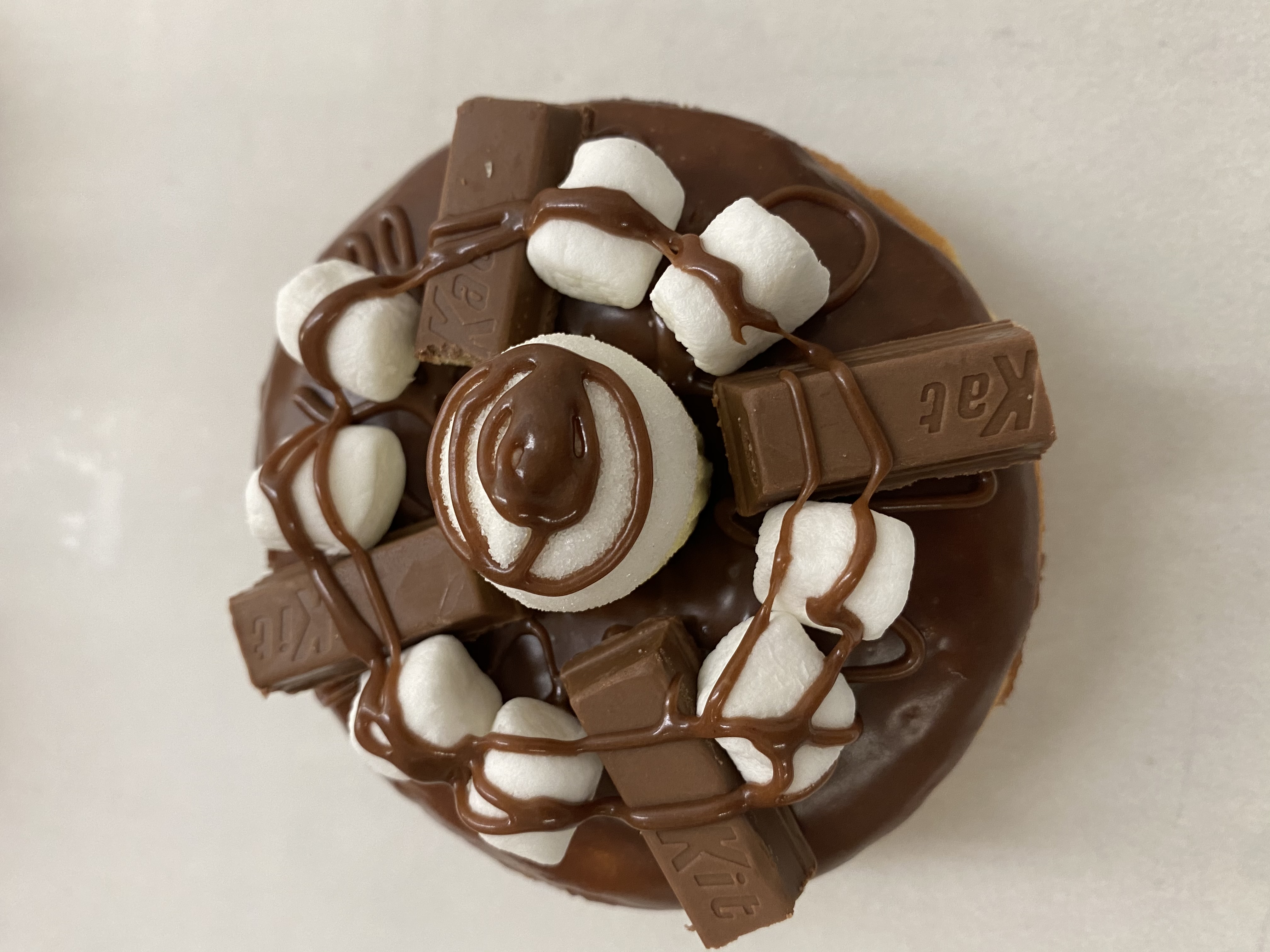 Order CHOCOLATE  MARSHMALLOW AND KITKAT DONUT  food online from Earl Donut store, Los Angeles on bringmethat.com