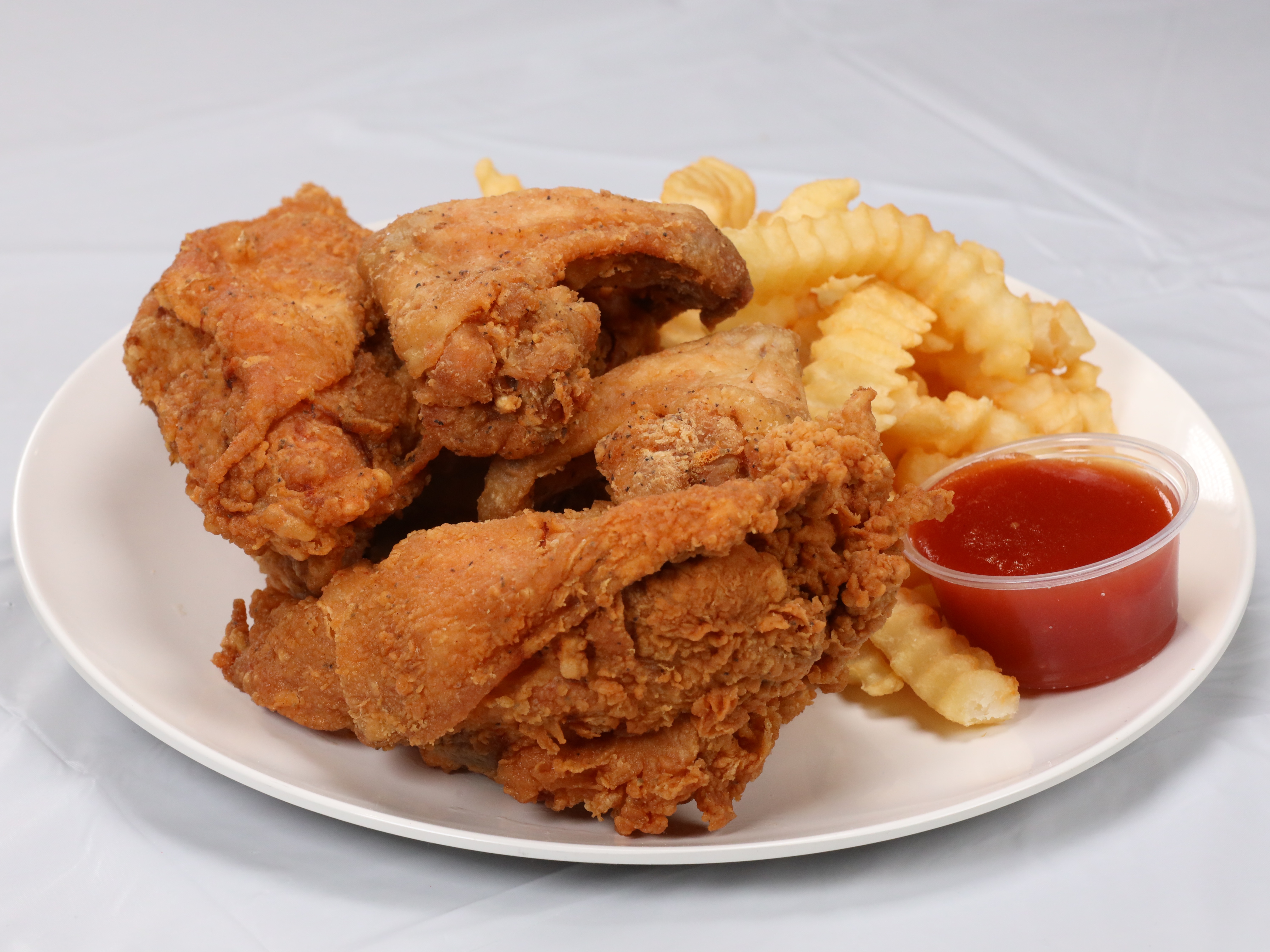 Order 1/2 White + Fries( 2 Breast And 2 Wings ) food online from Sam Sylks Chicken & Fish store, Cleveland on bringmethat.com