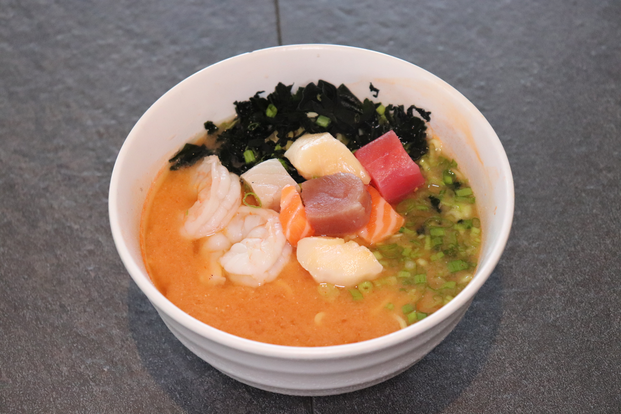 Order Spicy Seafood Soup food online from Toshiko Ramen And Sushi Bar store, Fresno on bringmethat.com