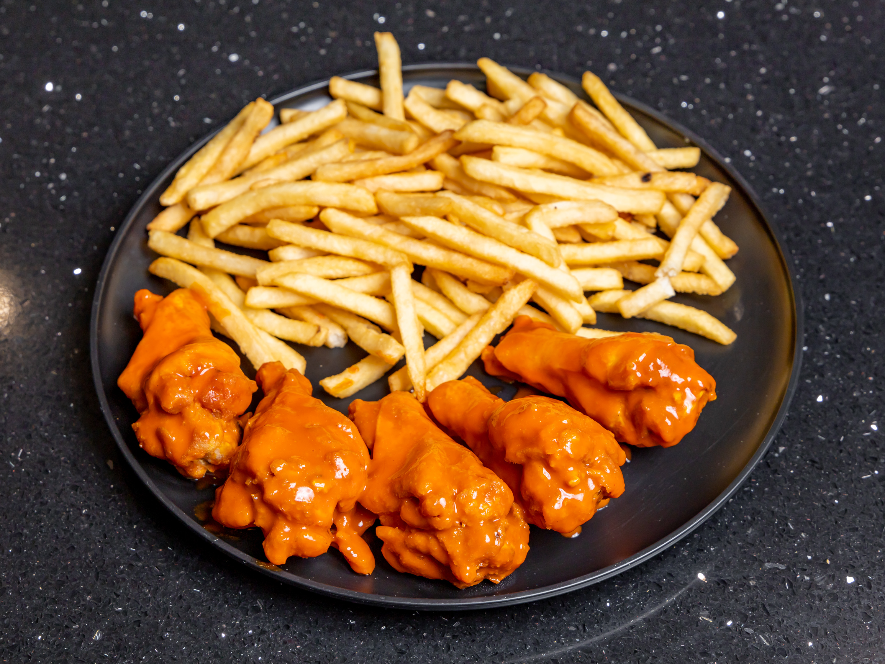 Order Wings food online from Laced Quality Kitchen store, Cambridge on bringmethat.com