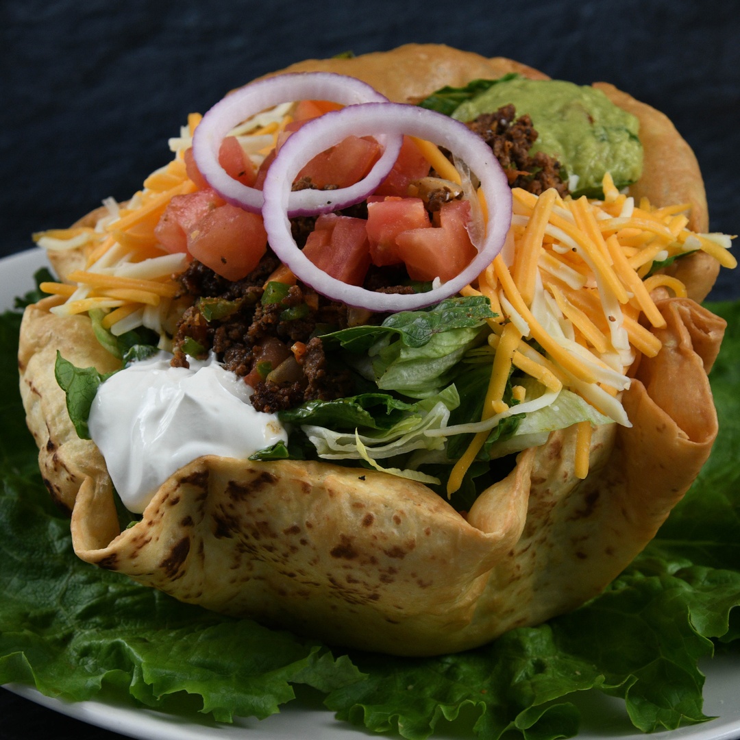 Order Taco Salad Beef food online from Rainforest Cafe store, Las Vegas on bringmethat.com
