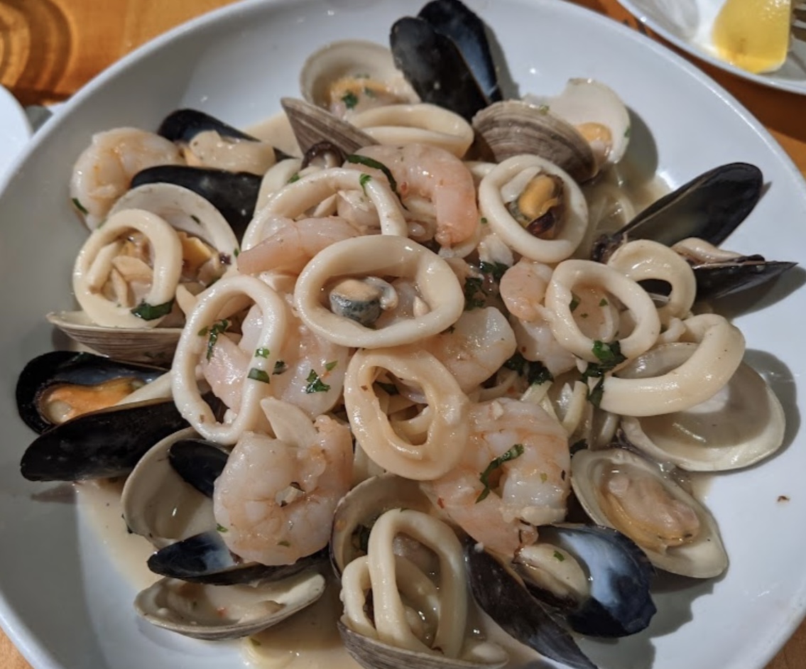 Order Seafood Linguini food online from Cappuccino Cafe store, Brooklyn on bringmethat.com