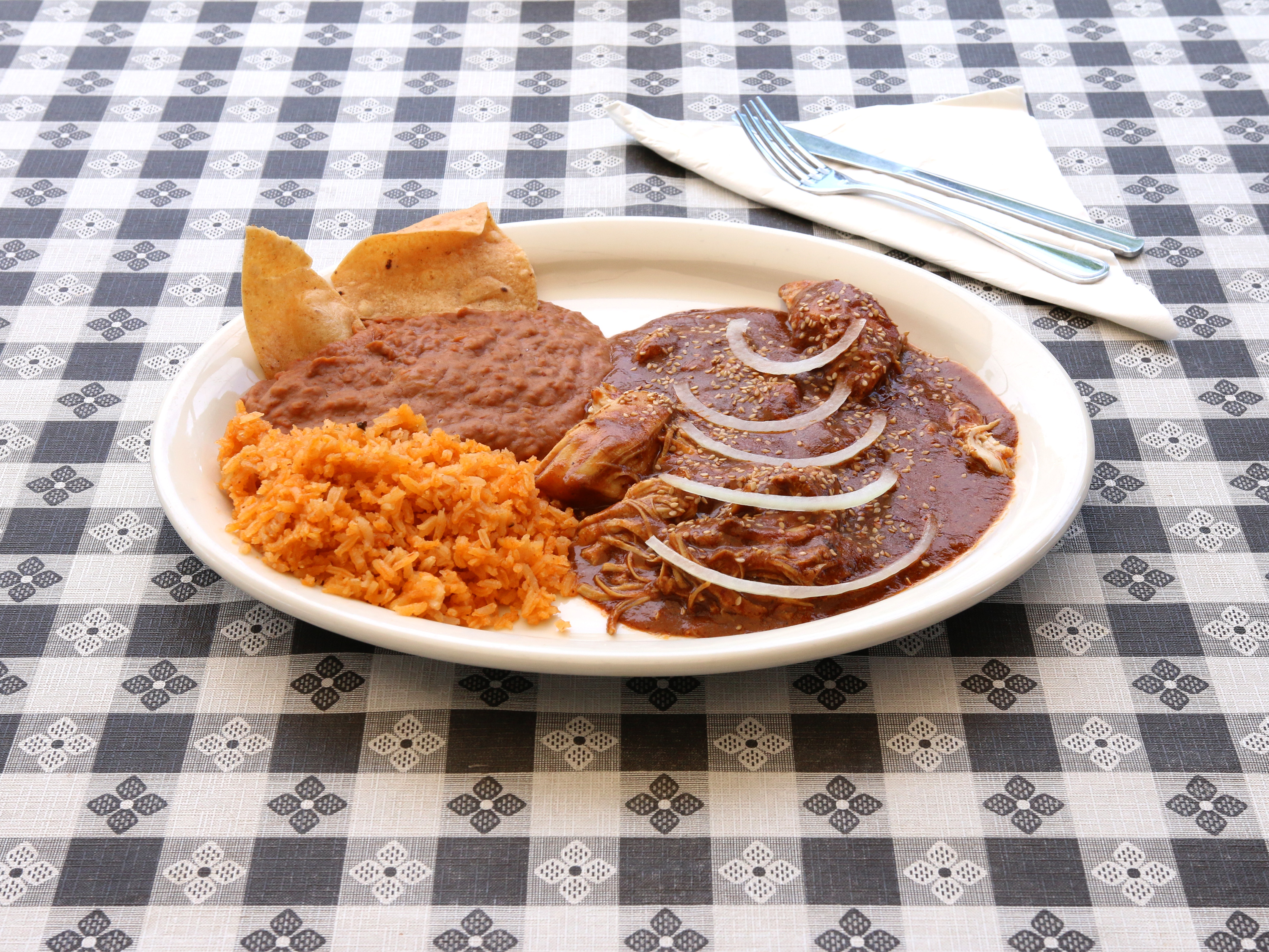 Order Pollo en Mole Plate food online from El Maguey Mexican Restaurant store, San Juan Capistrano on bringmethat.com