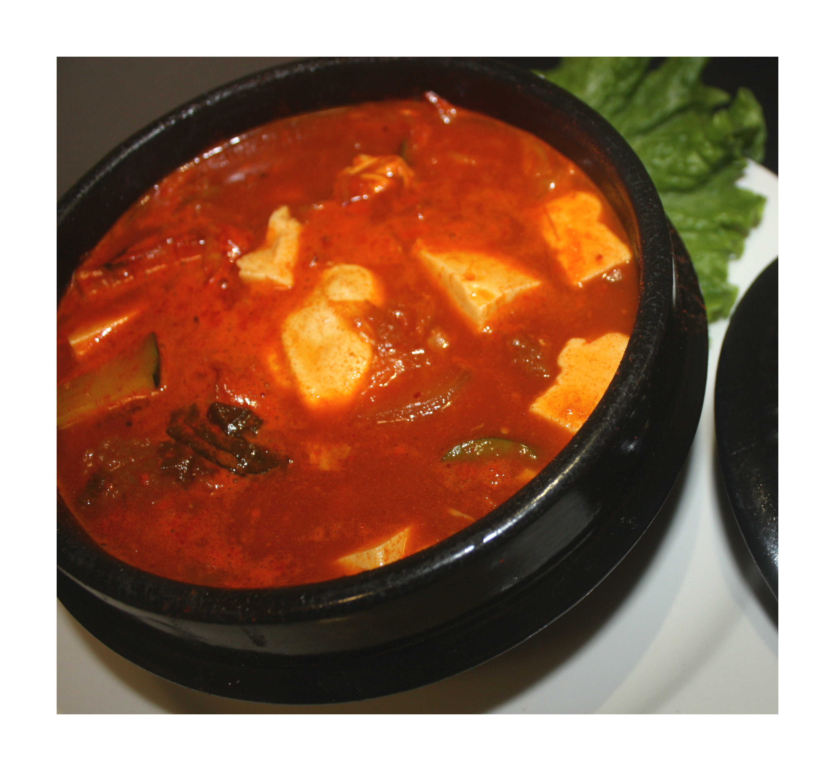 Order S3. Korean Spicy Tofu and Mushroom Soup food online from Nam's Noodle store, Madison on bringmethat.com