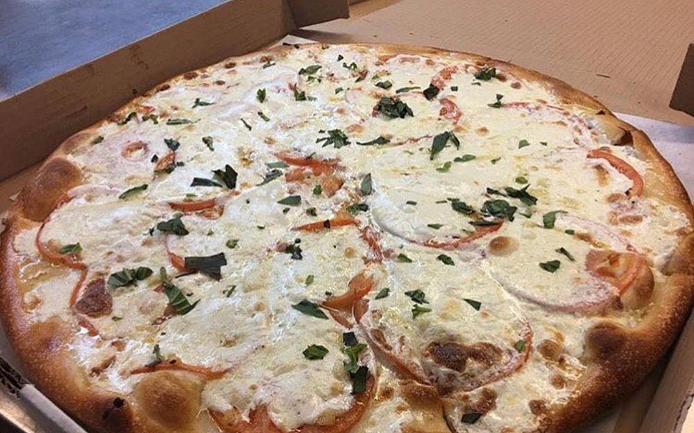 Order 33. Margherita Pizza - Small 12" (8 Slices) food online from Hometown Pizza store, Litchfield on bringmethat.com