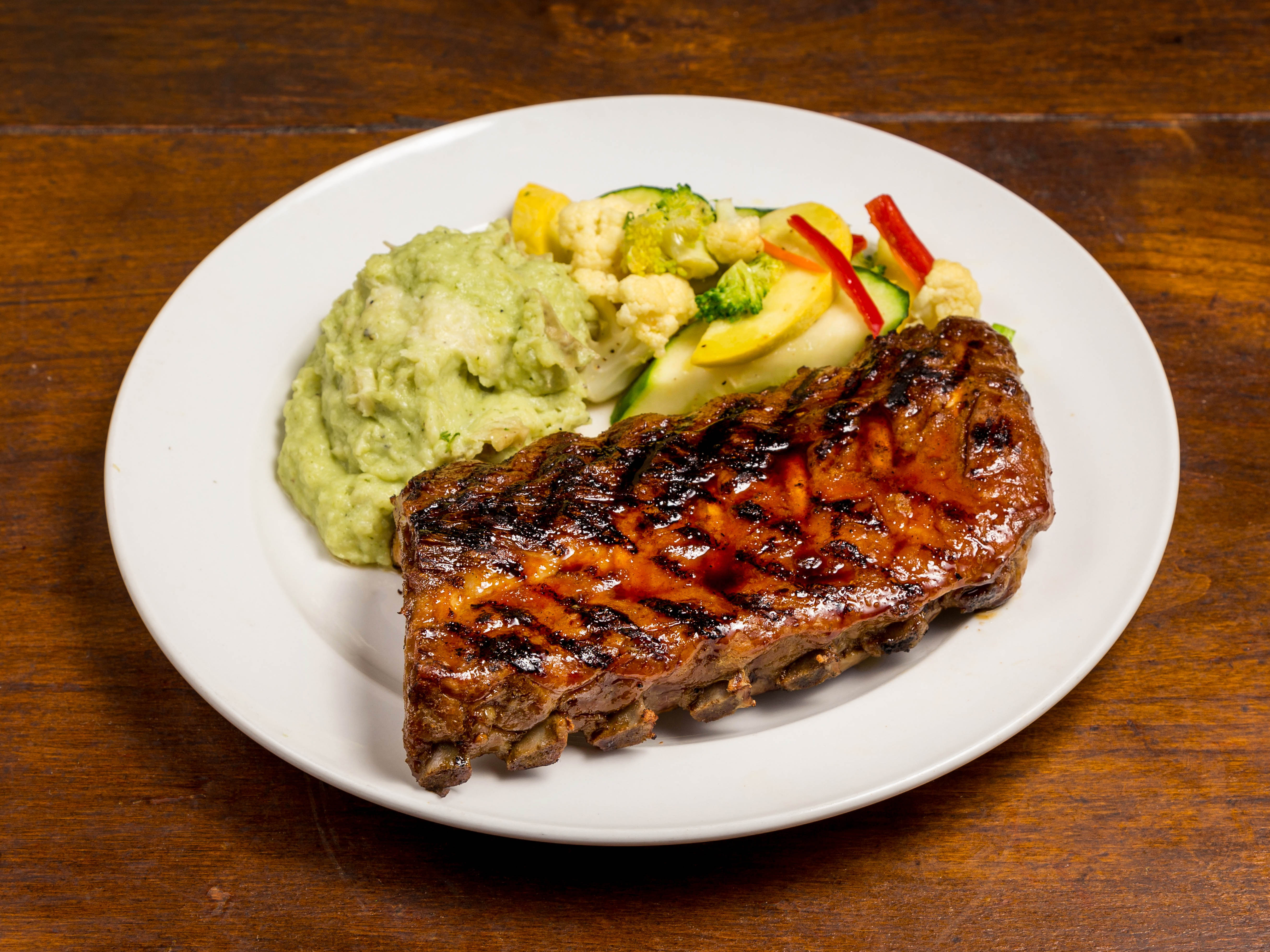 Order Glazed Baby Back Pork Ribs food online from HiFalutin Rapid Fire Western Grill store, Tucson on bringmethat.com