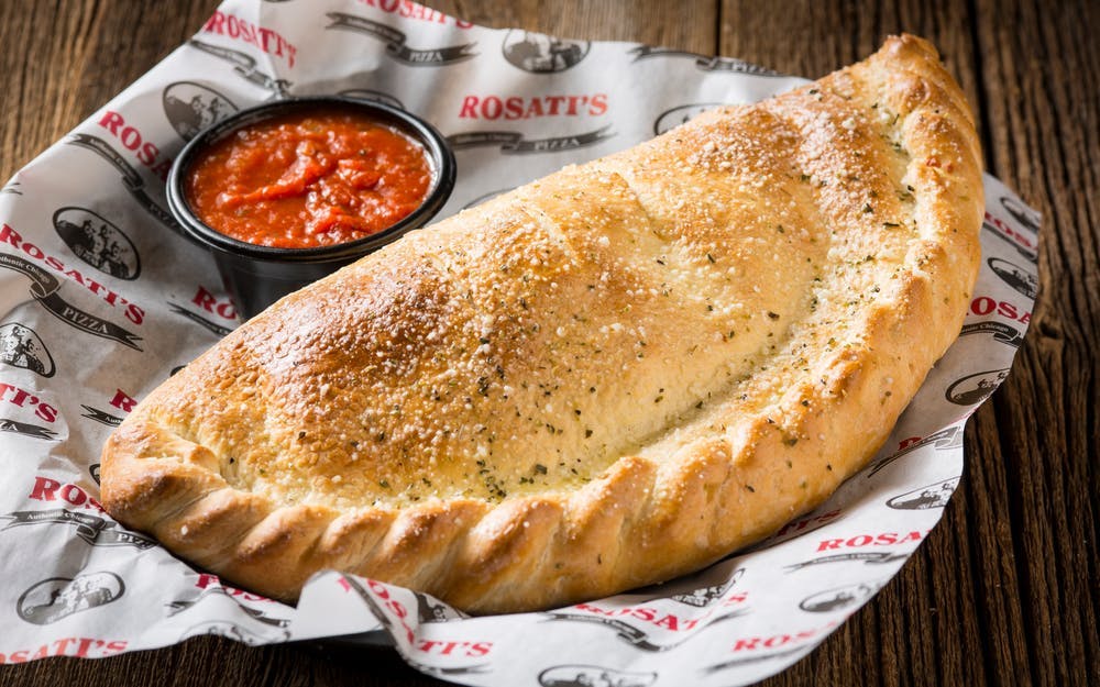 Order Cheese Calzone - Calzone food online from Rosati's Pizza store, Genoa on bringmethat.com