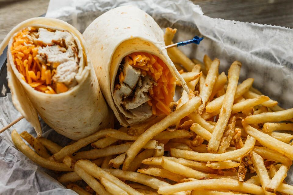 Order Abigail Chicken and Cheese Wrap food online from Big Mike's Sports Bar & Grill store, Denham Springs on bringmethat.com