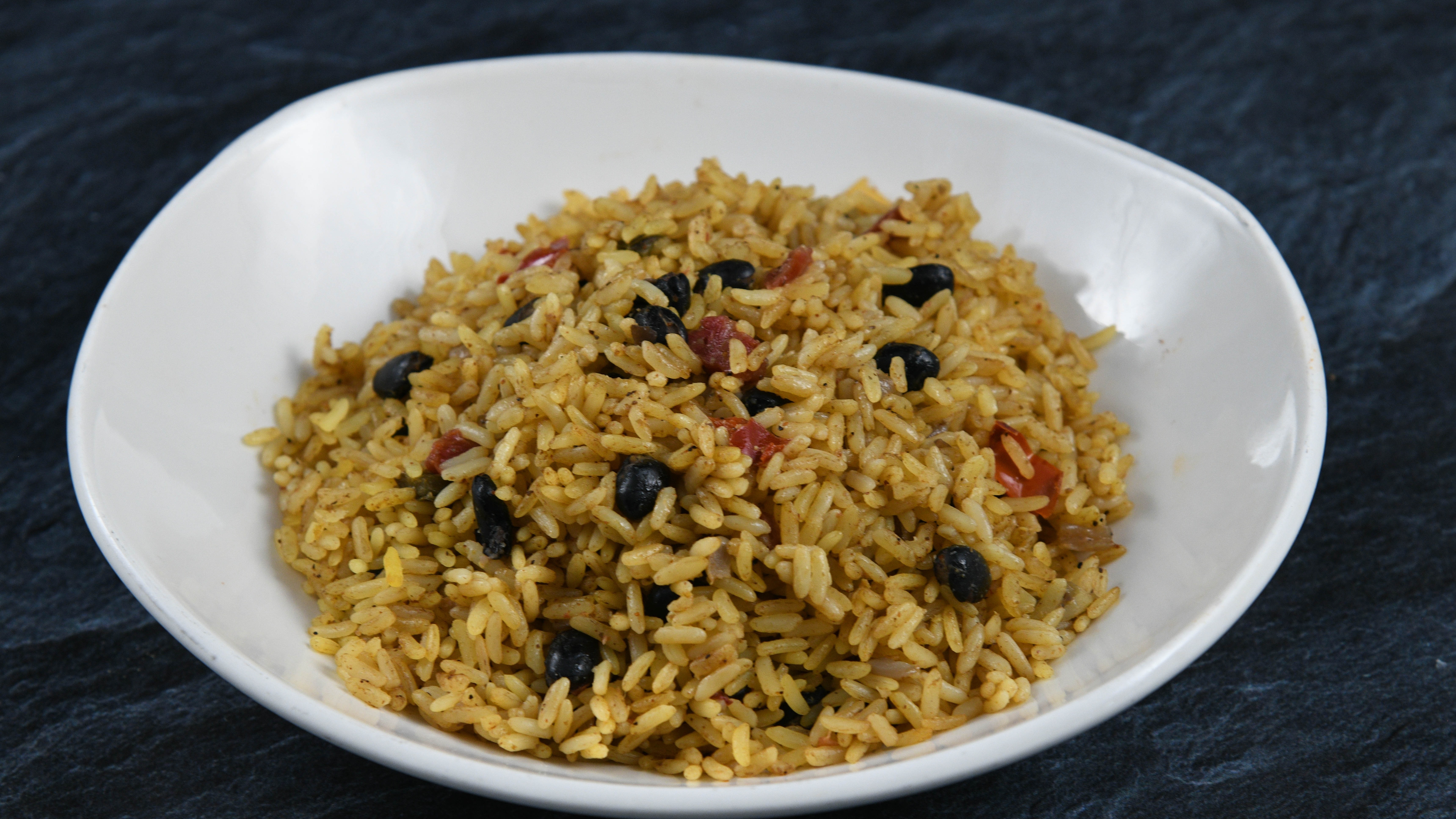 Order Caribbean Rice food online from Rainforest Cafe store, Atlantic City on bringmethat.com