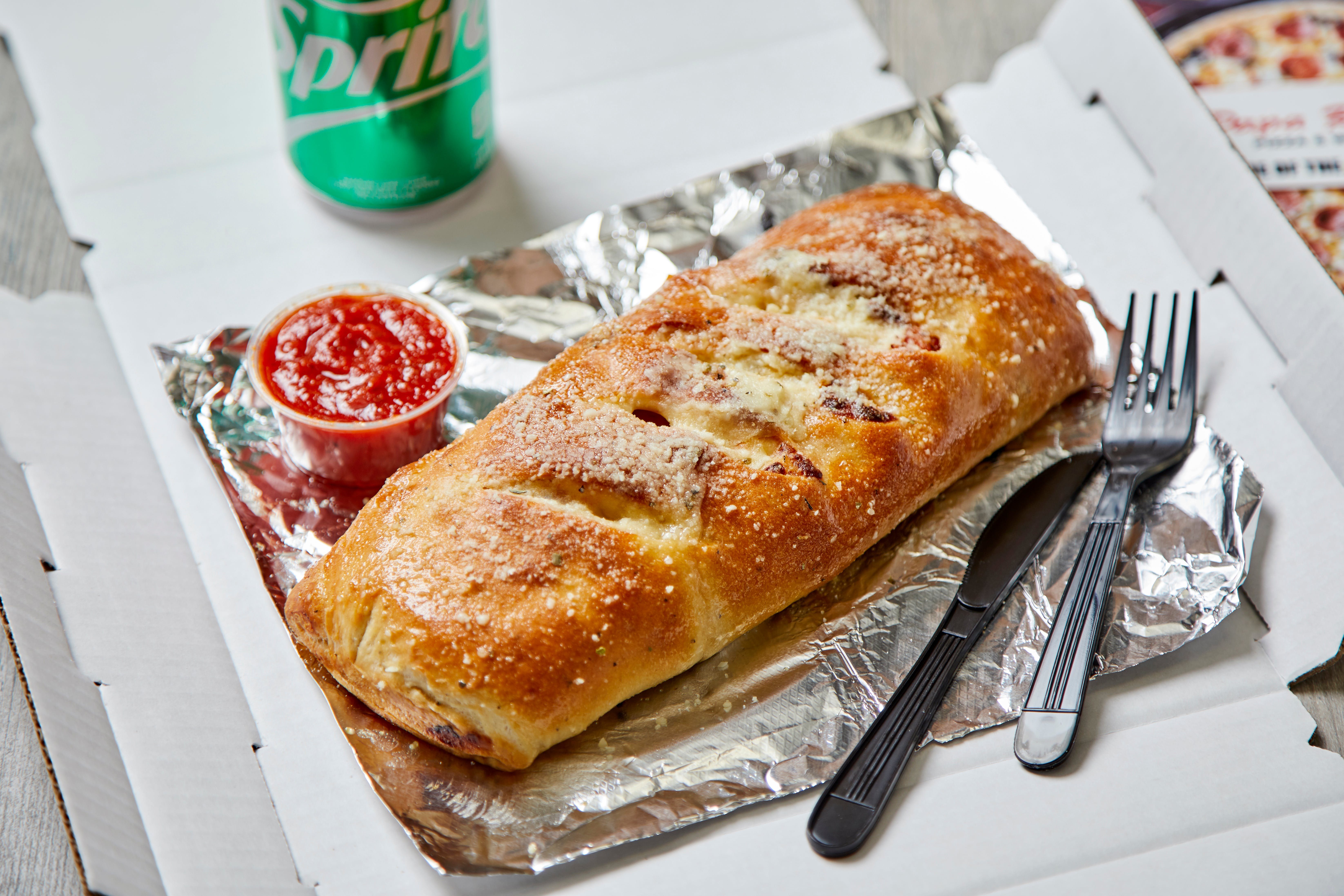 Order The Works Calzone - Calzone food online from Papa Ray's Pizza & Wings store, Indianapolis on bringmethat.com