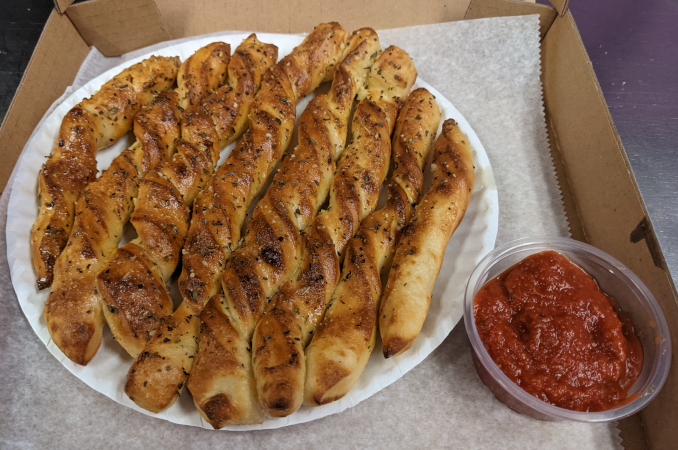 Order Garlic Bread Sticks food online from Magpies Gourmet Pizza Houghton store, Tucson on bringmethat.com