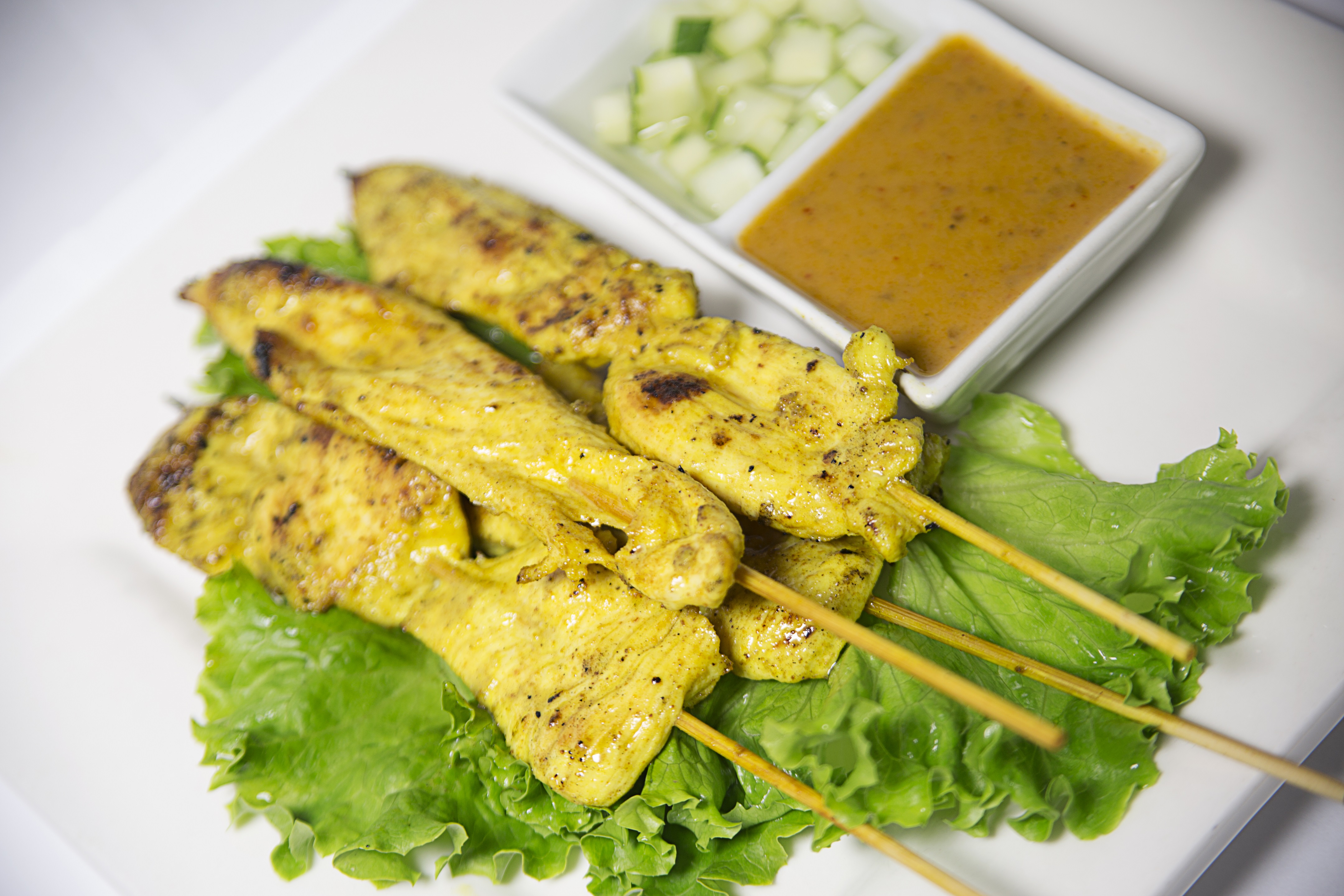 Order Satay Chicken food online from Sweet Basil store, Woodside on bringmethat.com