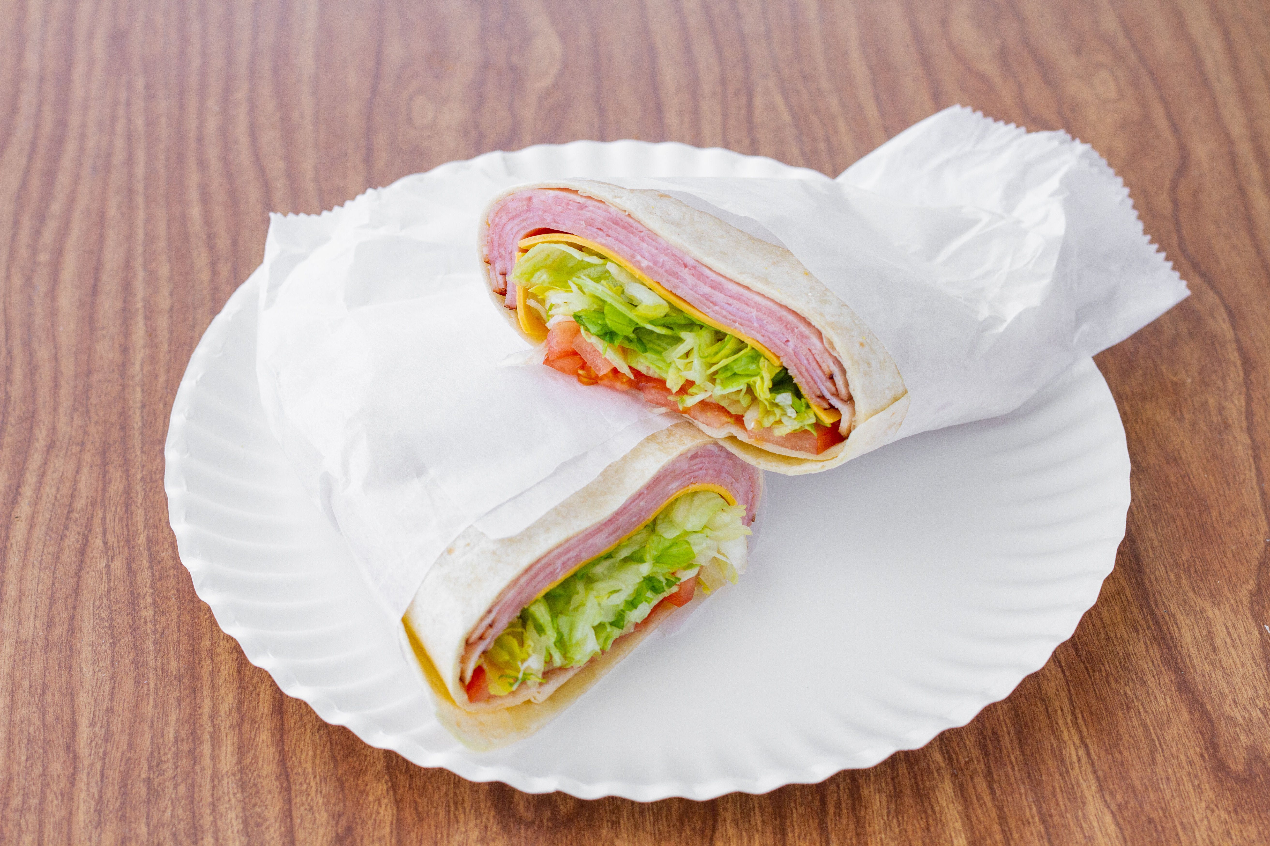 Order Ham & Cheese Wrap - Wrap food online from Pizza Connection store, Cockeysville on bringmethat.com