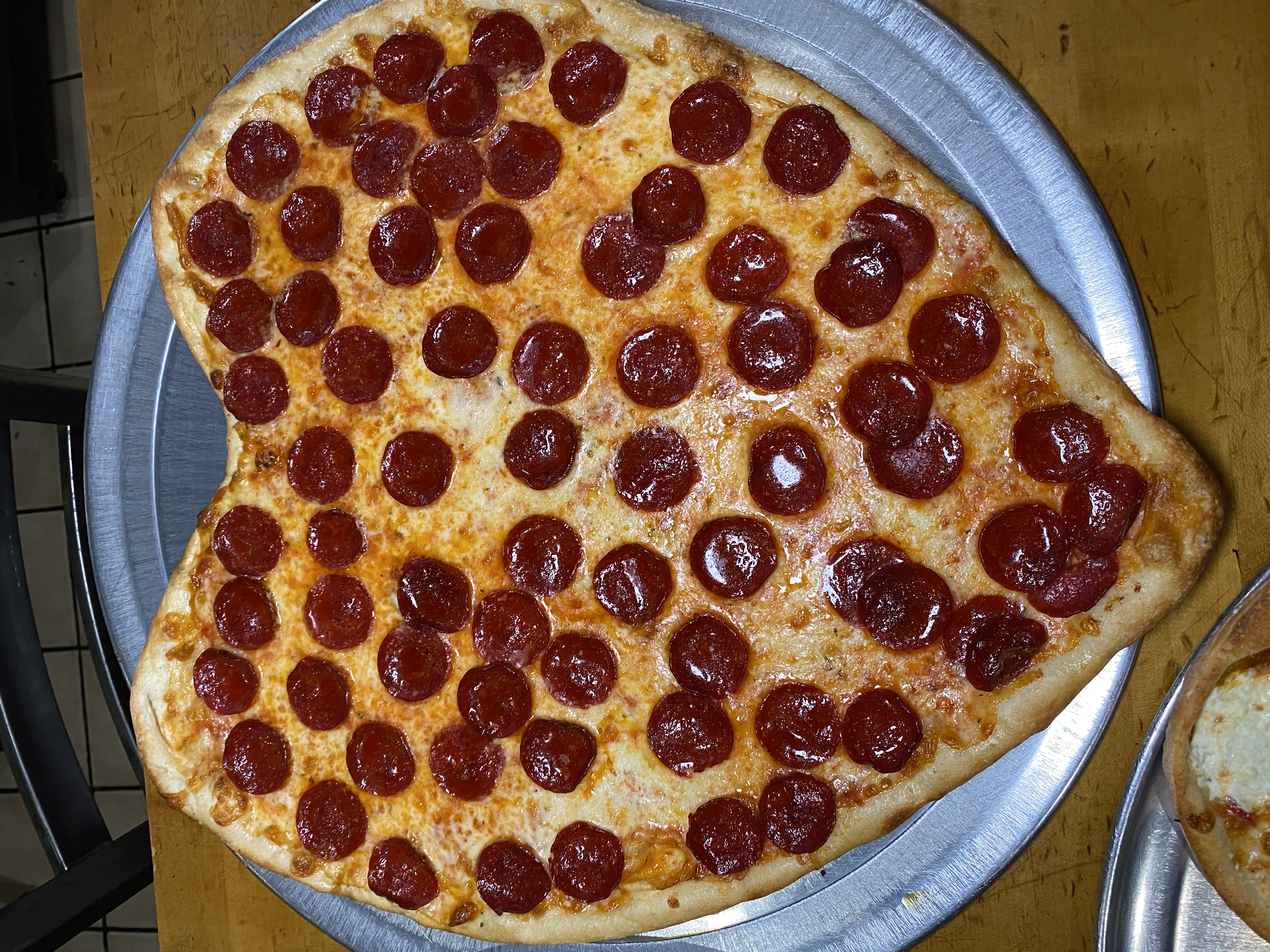 Order Heart Shaped Pepperoni Pizza 18” food online from East Village Pizza & Kebabs store, New York on bringmethat.com
