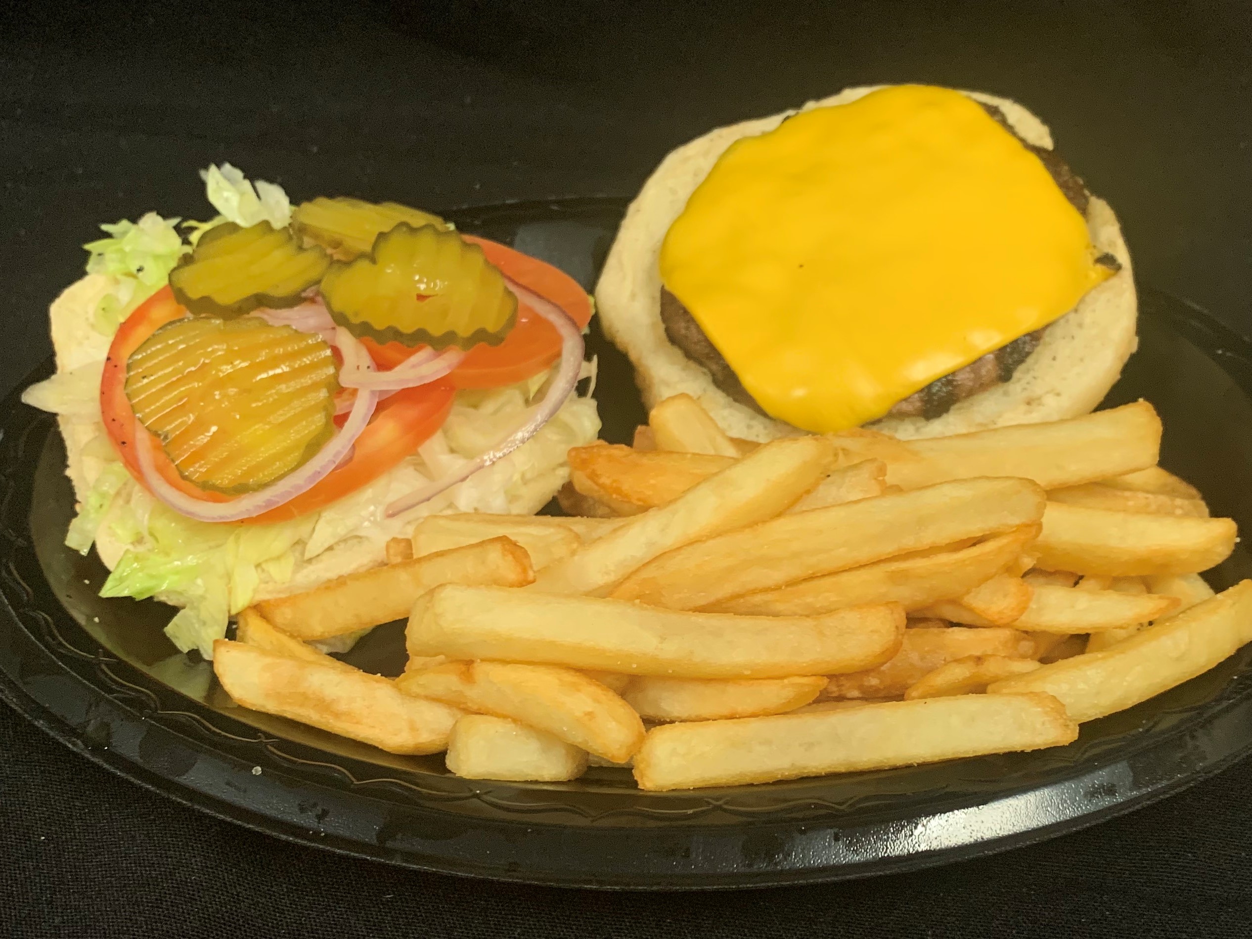 Order Medium Burger Basket w/ French Fries food online from Tony Subs & Pizza store, Inglewood on bringmethat.com