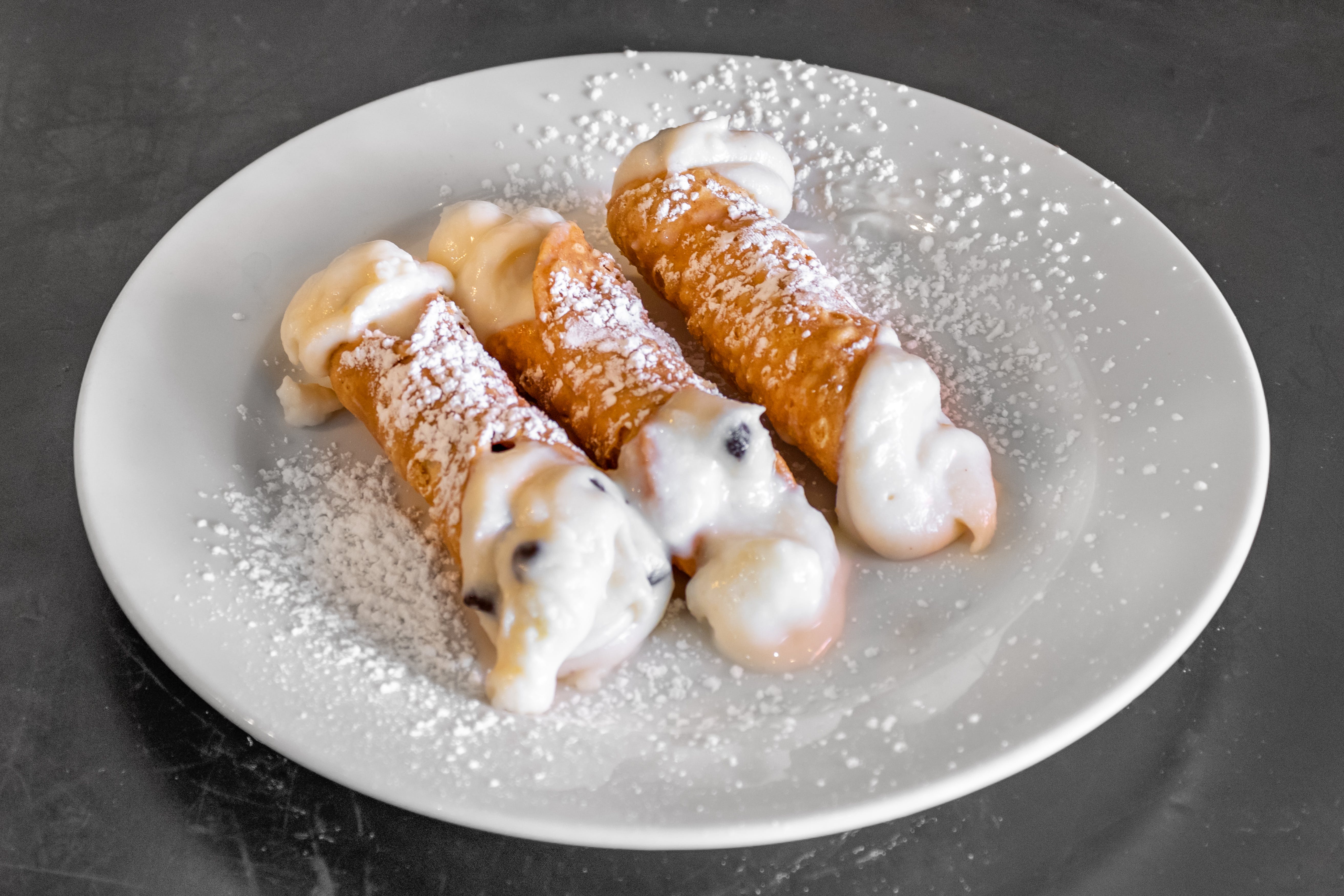 Order Mini Cannolis - 3 Pieces food online from Europa Pizza store, Carmel on bringmethat.com
