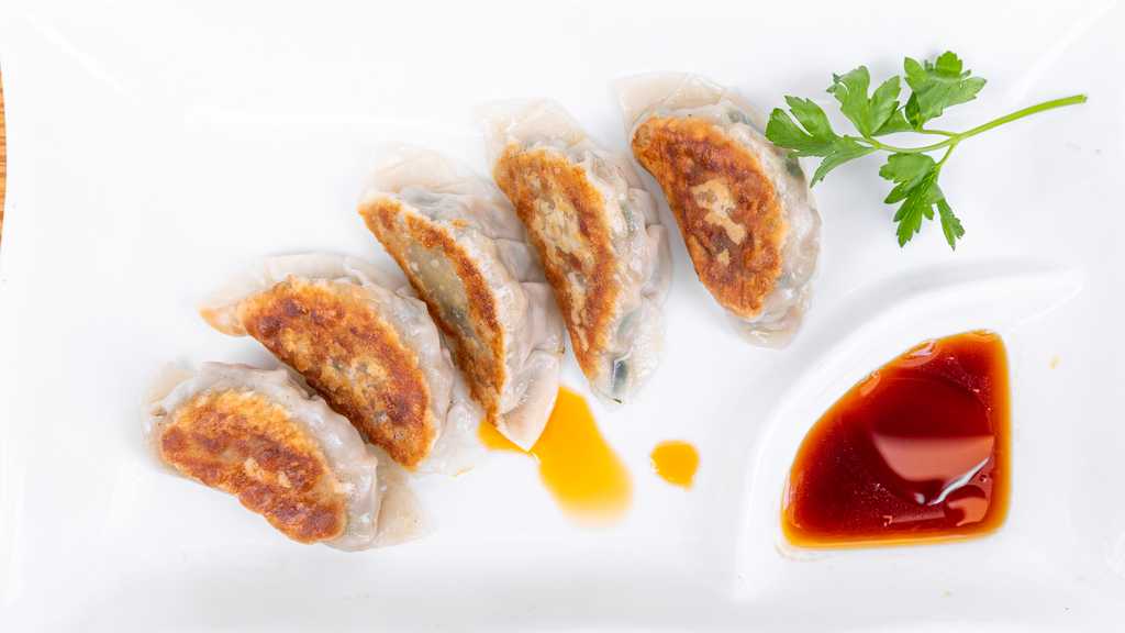 Order 8 Fried Dumpling 锅贴 food online from Cj Chan Restaurant store, Dayton on bringmethat.com