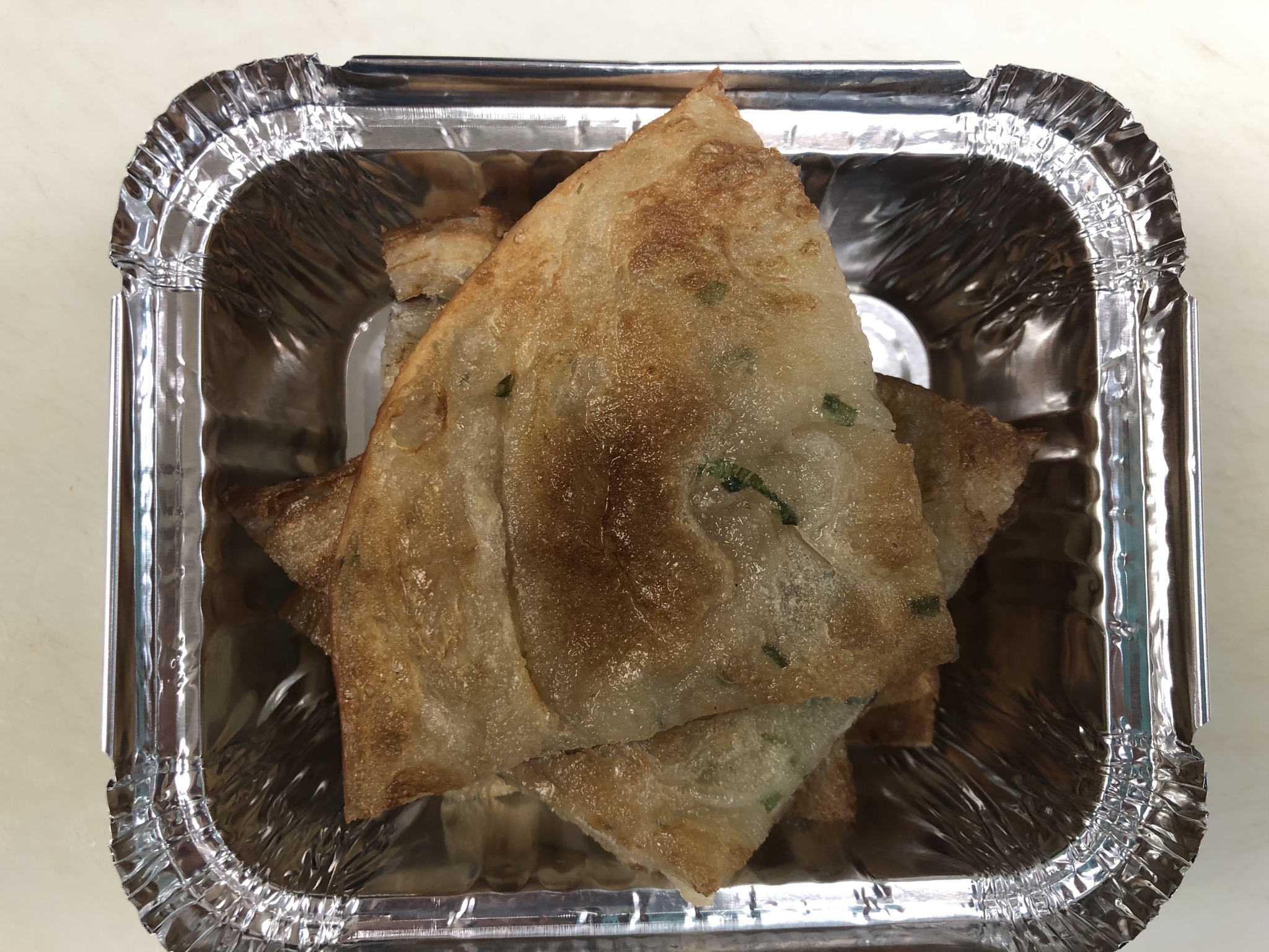 Order 16. Scallion Pancakes 葱油饼 food online from JJ China store, Morrisville on bringmethat.com