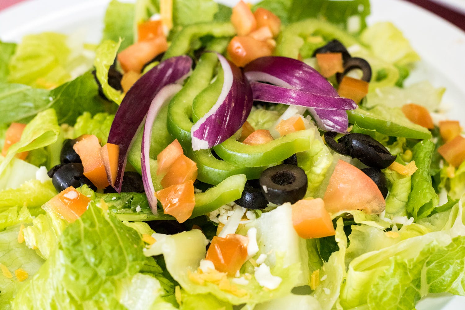 Order Garden Salad - Small food online from Happy Pizza store, Manteca on bringmethat.com