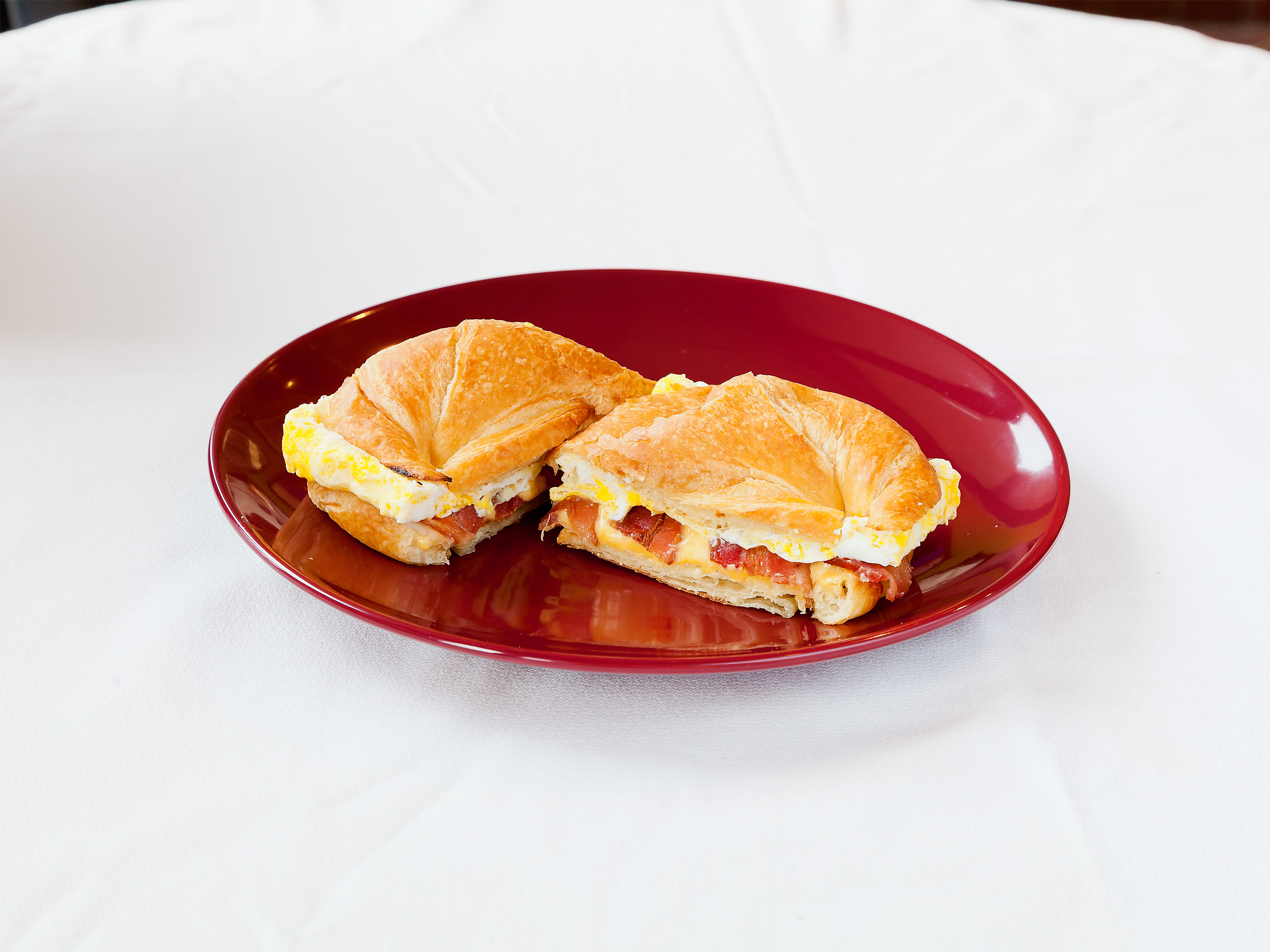 Order Croissant Breakfast Sandwich food online from Rossi's Cafe & Deli store, Concord on bringmethat.com