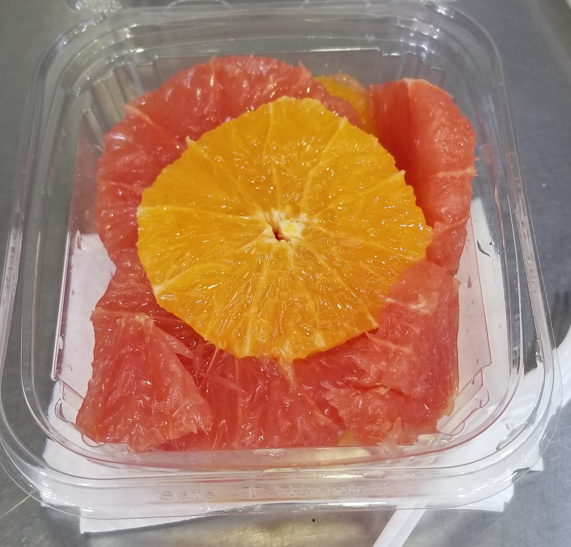 Order Fresh Cutup Orange Ruby Red Grapefruit Salad  food online from Amsterdam Deli store, New York on bringmethat.com