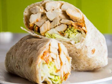 Order Blackened Chicken Caesar Wrap food online from Tharsy Grill store, Baltimore on bringmethat.com