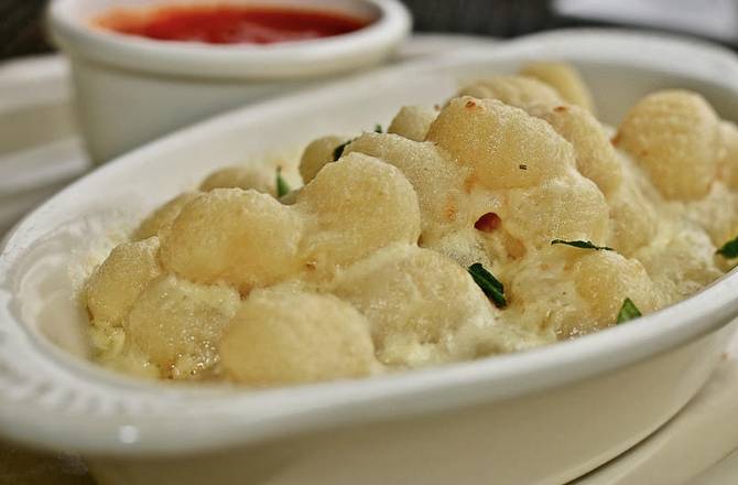 Order Gnocchi Quattro Formaggio food online from Bambinelli Roswell store, Roswell on bringmethat.com