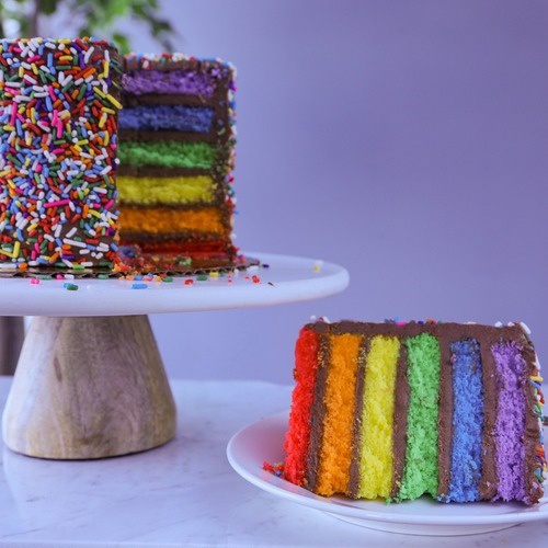 Order 6" Rainbow Fudge Cake food online from Carlo's Bakery store, Bloomington on bringmethat.com