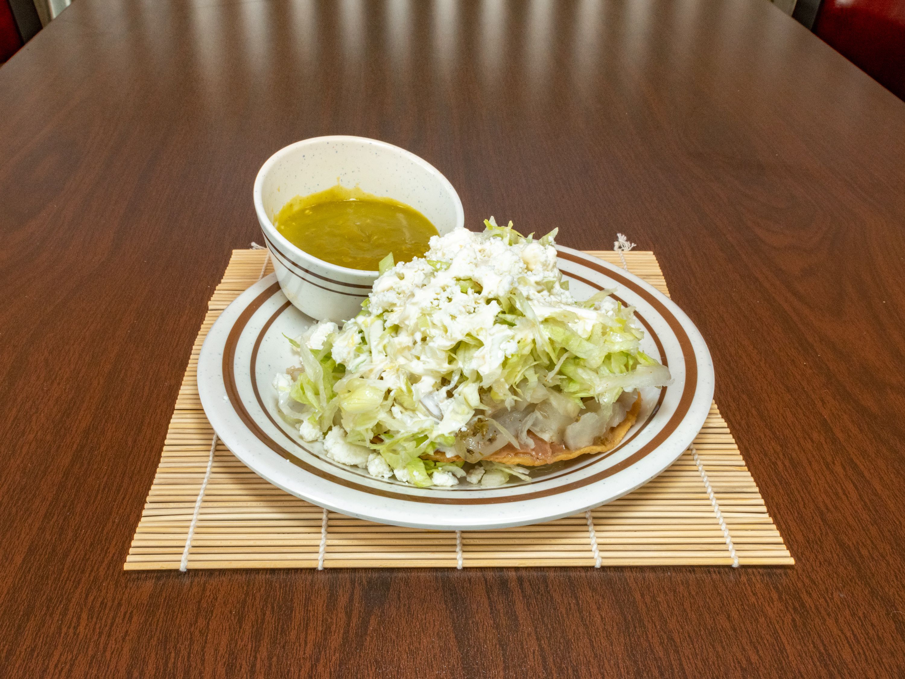Order Tostada de Pata food online from Tamales Dona Tere-Wayside store, Houston on bringmethat.com