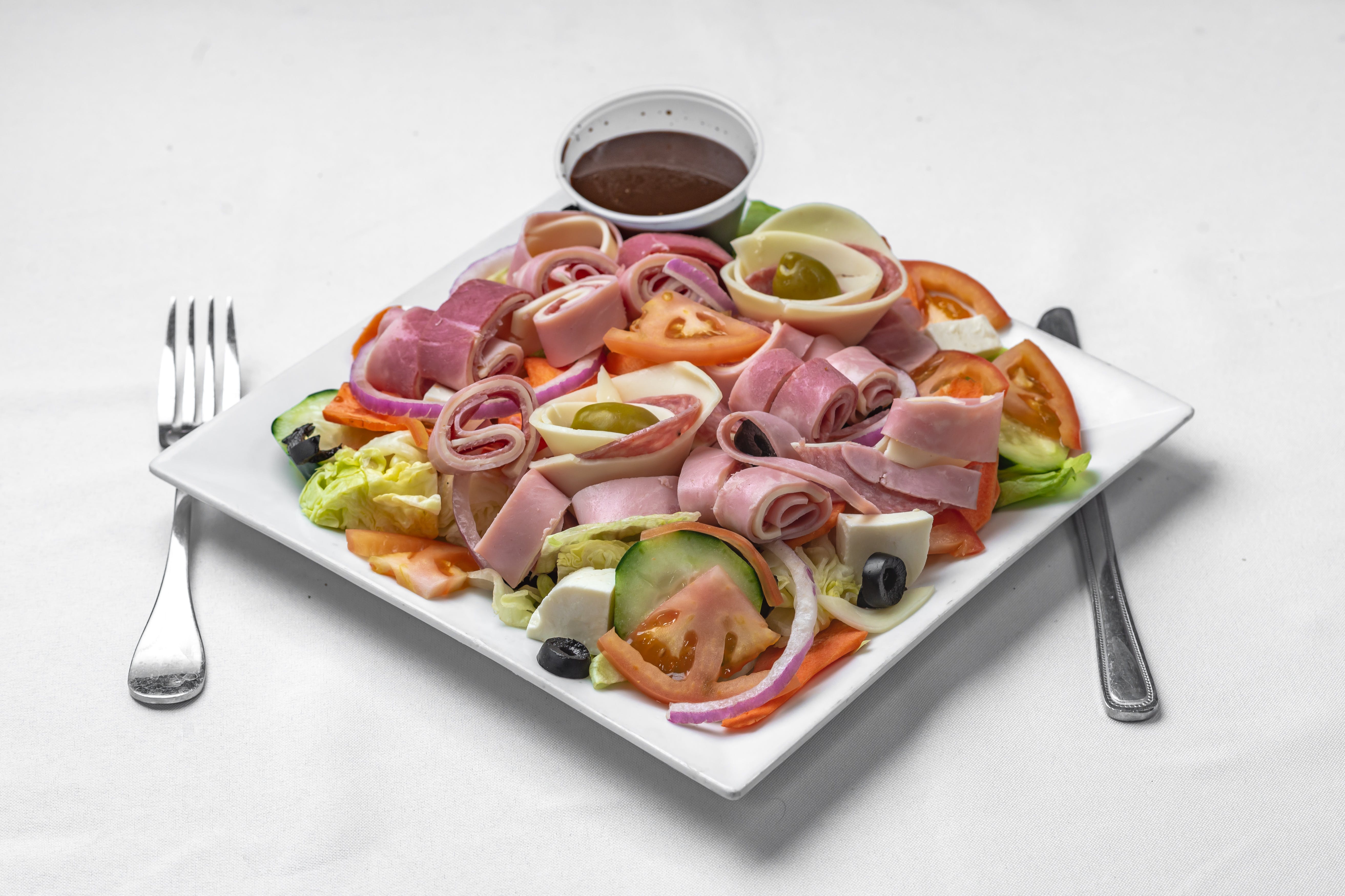 Order Antipasto Salad - Serves 1 Person food online from Leo Pizza Italian Restaurant store, Washington on bringmethat.com